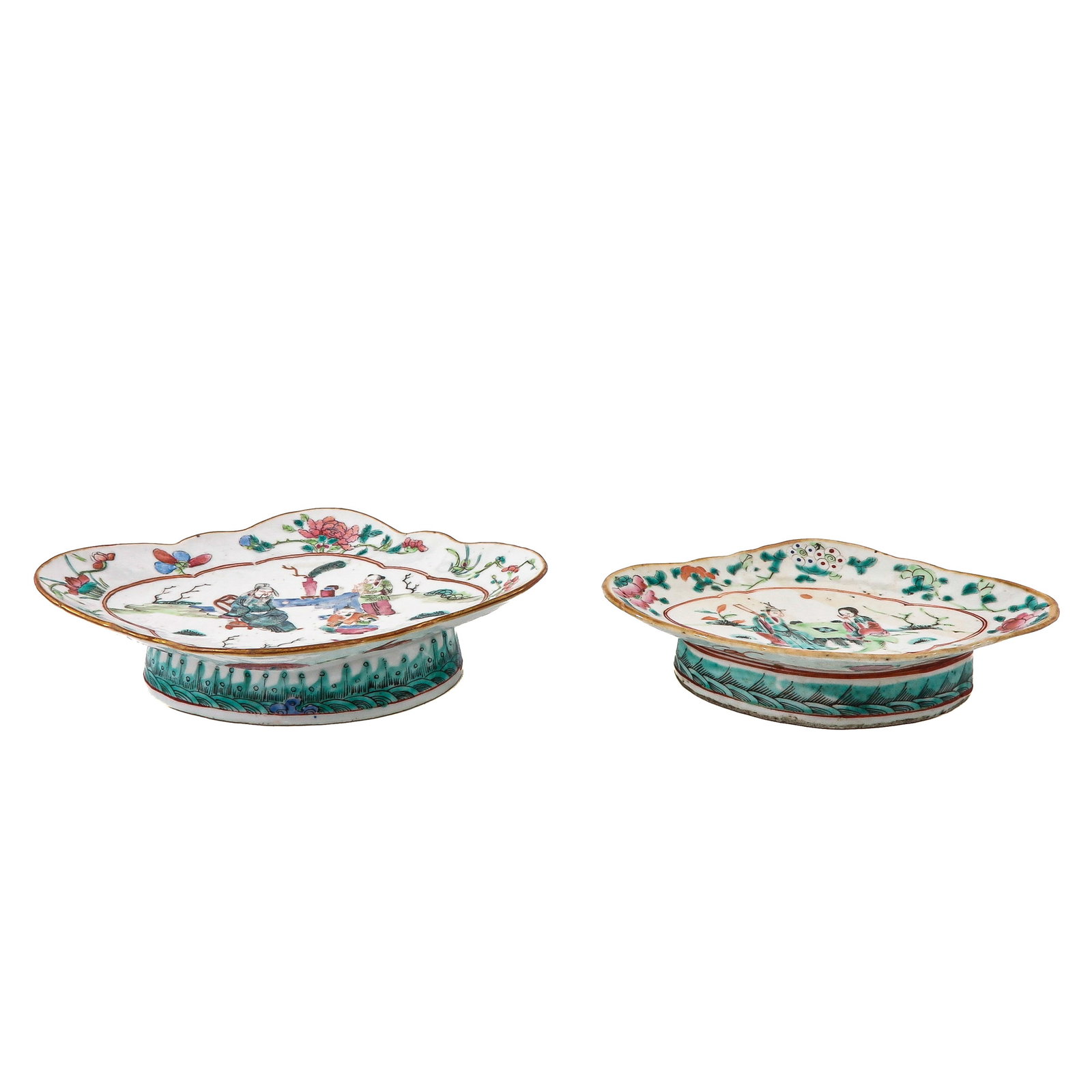 A Lot of 2 Famille Rose Altar Plates: Depicting Chinese figures in a garden, 19th Century, 23 cm. long, hairline.