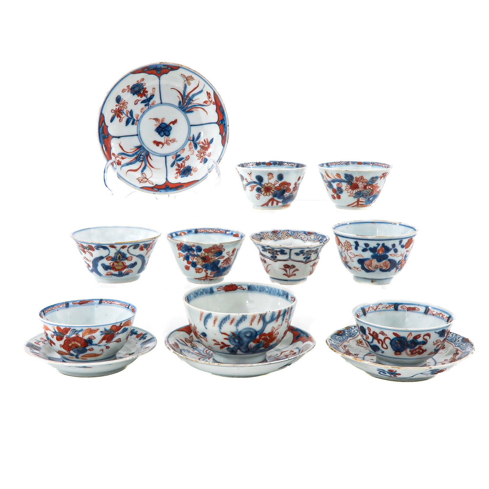 A Group of Cups and Saucers: 13 pieces, in a variety of decors, including 18th Century, largest saucer is 12 cm. chip.