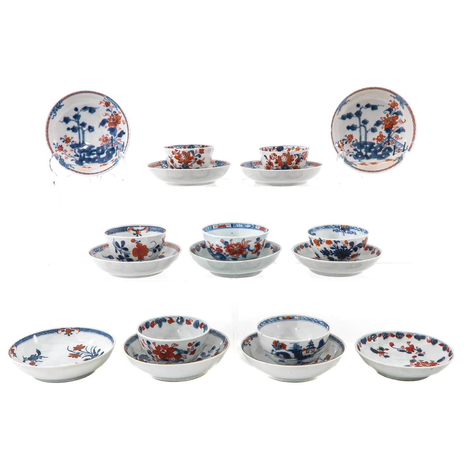 A Group of Cups and Saucers: In a variety of decors, including 18th Century, largest saucer is 13 cm. in diameter, chip and hairline.