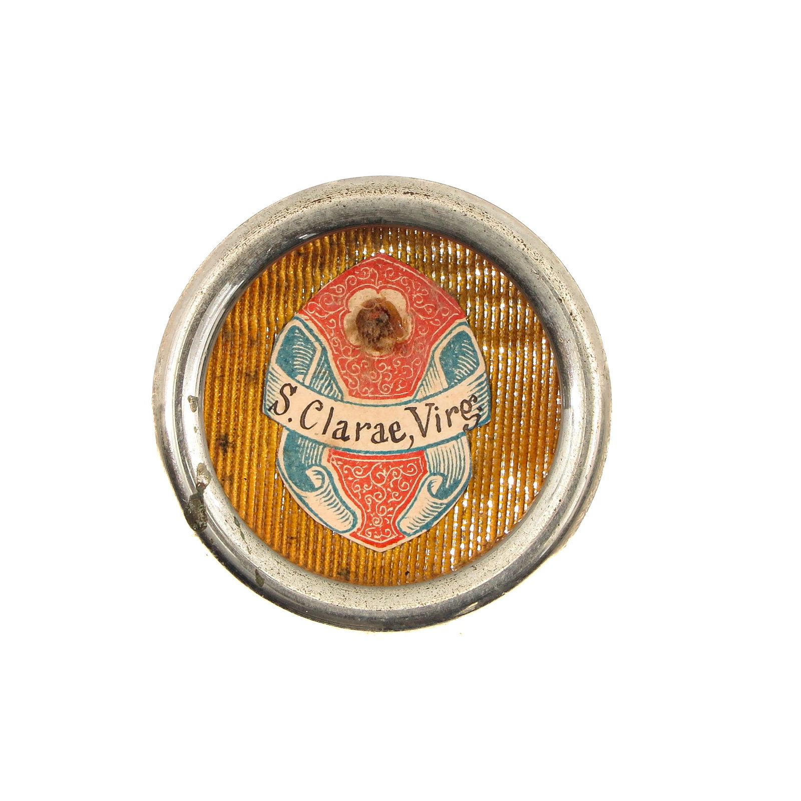 A Sealed Theca: Containing a relic of Saint Clare of Assisi (virgin, patroness of television and embroiderers), diameter 4 cm. You are purchasing the theca; the relics are a gift.