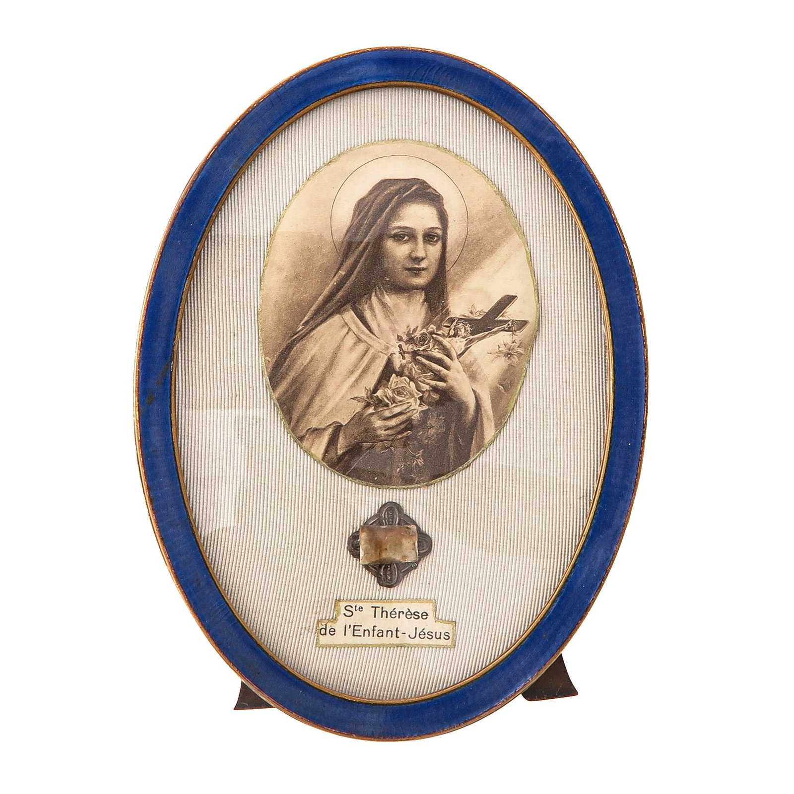 A Relic Stand: Containing a relic of Saint Theresa of the Child Jesus (patroness of missionaries and florists), height 14 cm. You are purchasing the theca; the relics are a gift.