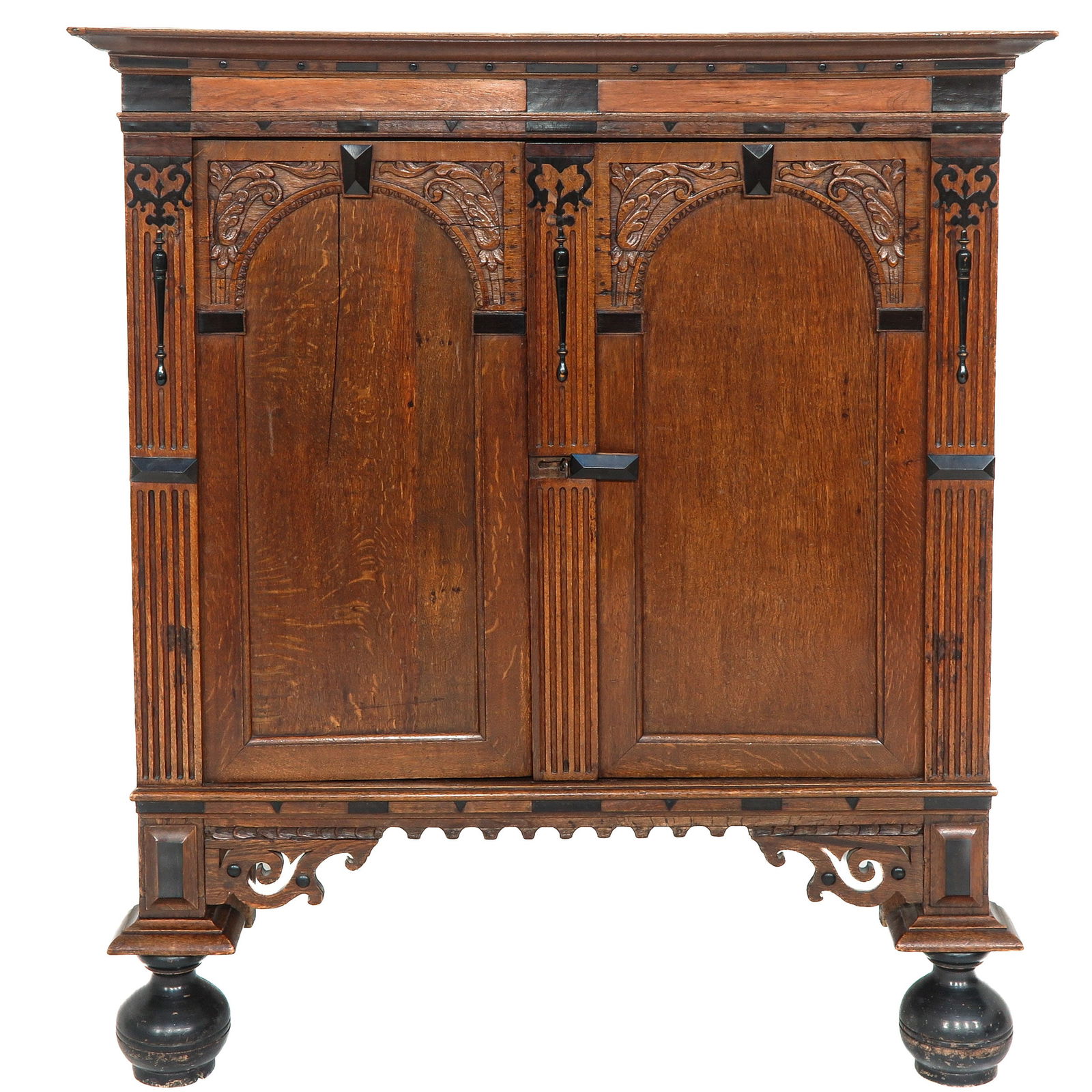 A 2 Door Cabinet: Two doors with carved panels, on ball feet, 126 x 141 x 56 cm.