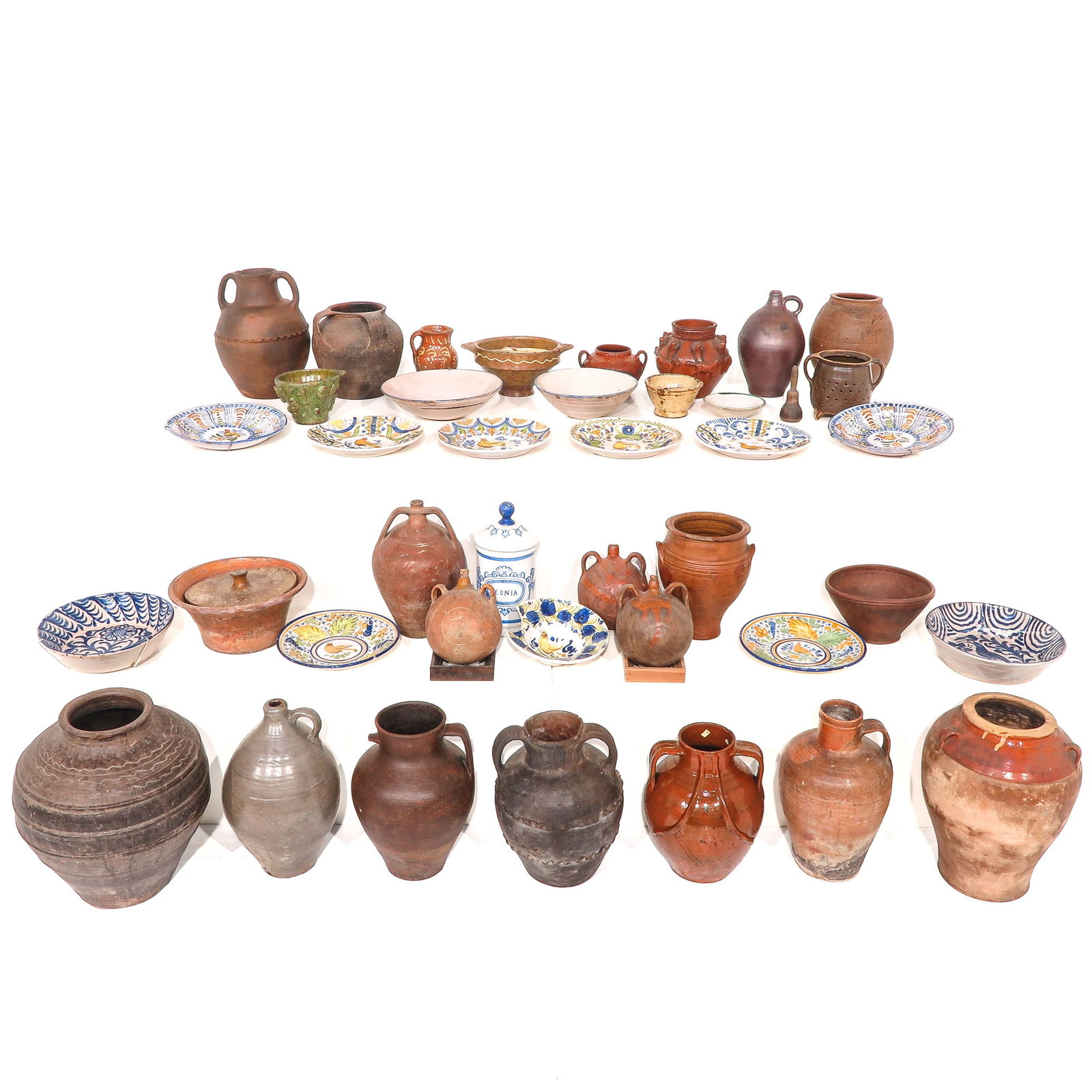 A Large Group of Pottery and Stoneware: Consisting of various pottery, including olive jars, tallest 48 cm.