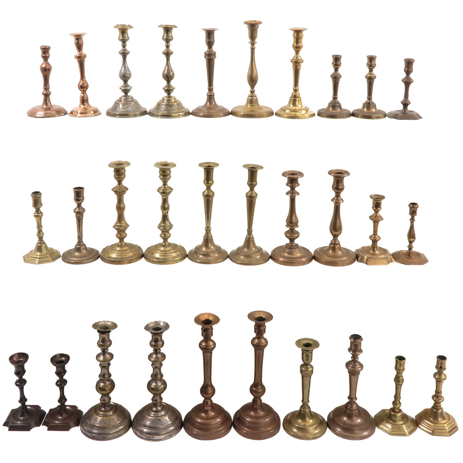 A Group of 30 Candlesticks: Consisting of 30 candlesticks in various sizes and styles, 19th century, tallest 29 cm.