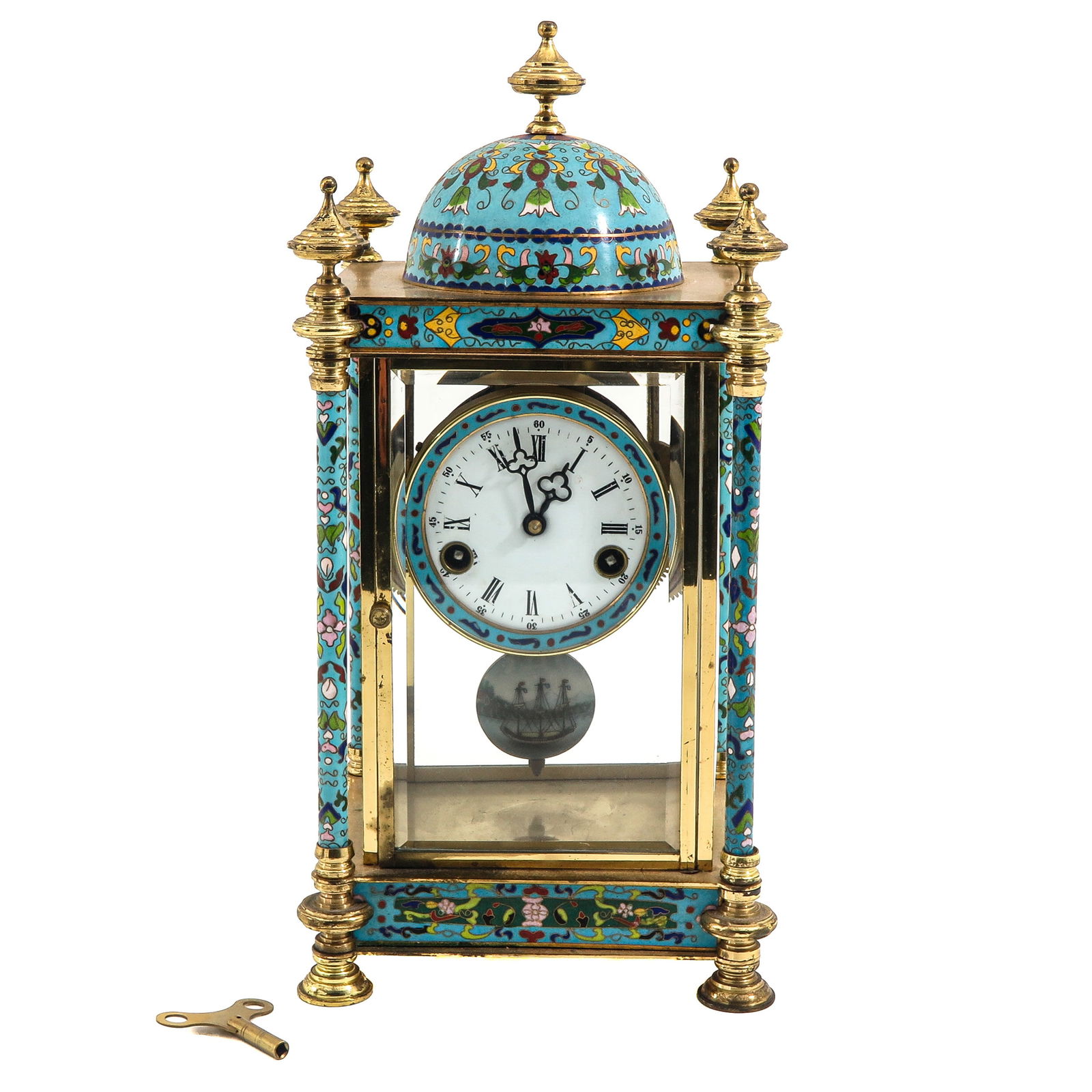 A Cloisonné Pendule: Cloisonné, with the sides decorated with enamel panels, height 42 cm.