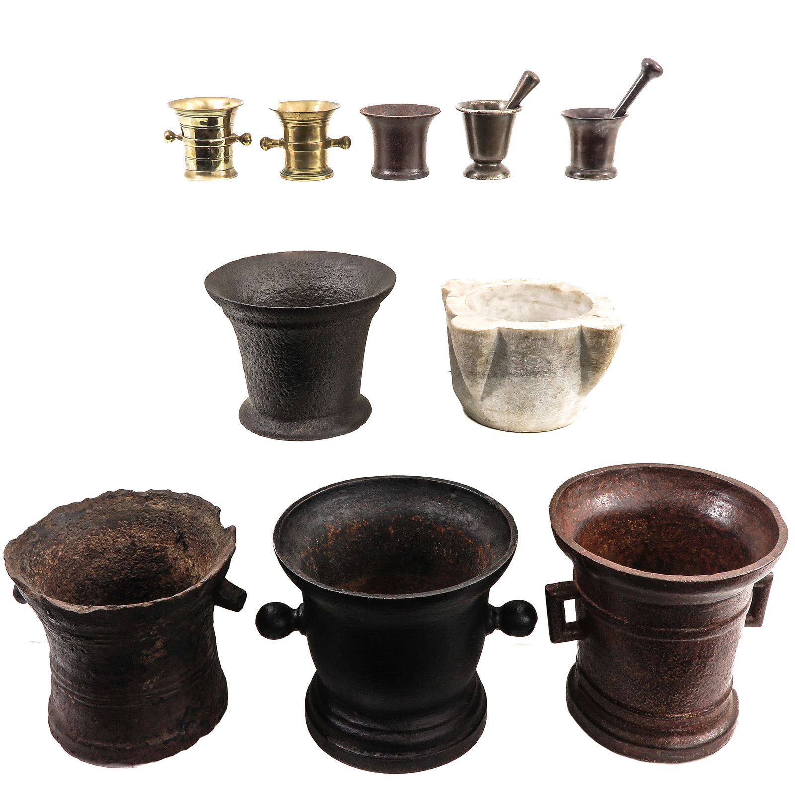 A Group of Mortars and Pestles: Consisting of mortars and pestles of various materials, the tallest mortar 33 cm.