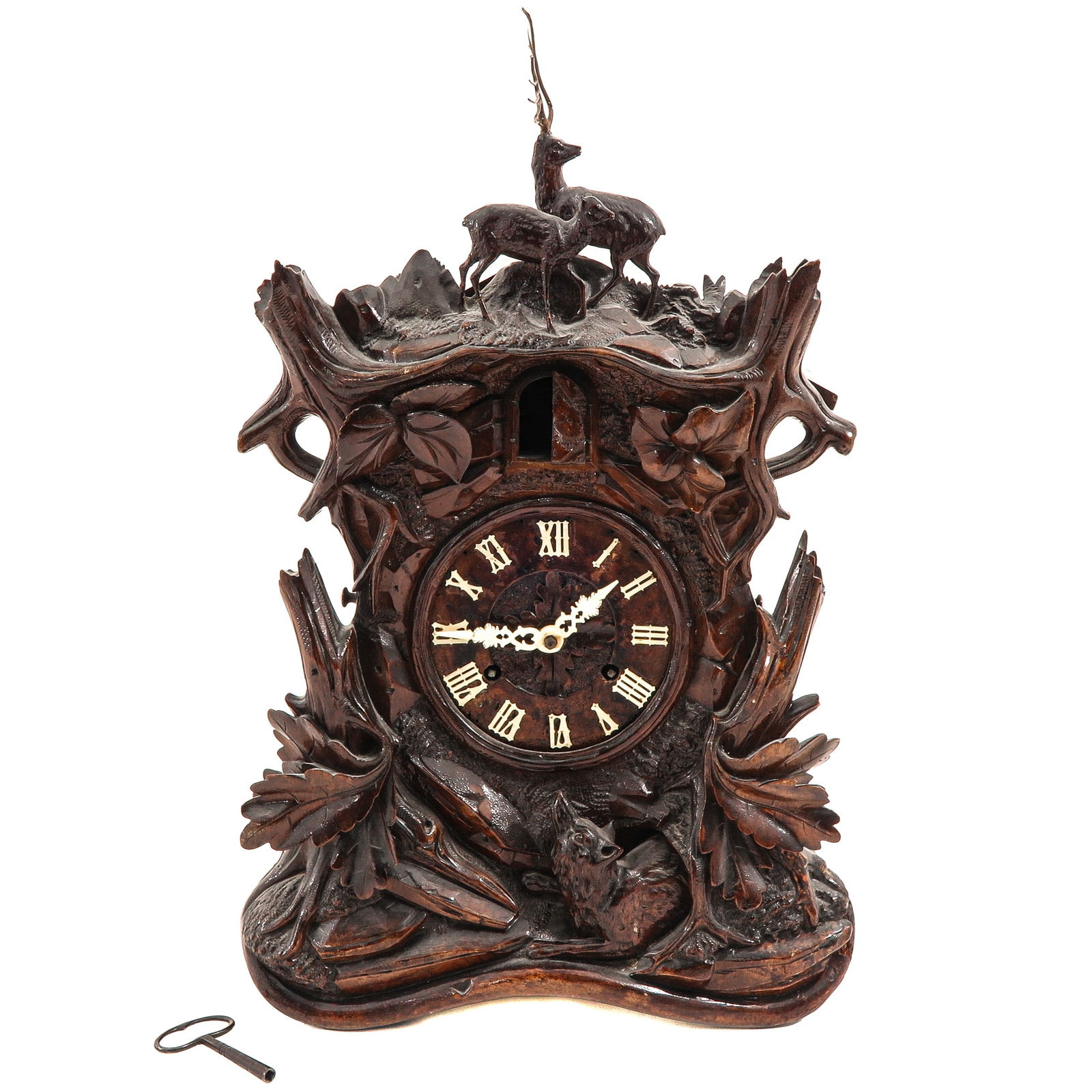 A Cuckoo Clock: Germany, ca. 1900, with sticker on the back from Camerer Cuss & Co., London, height 54 cm.