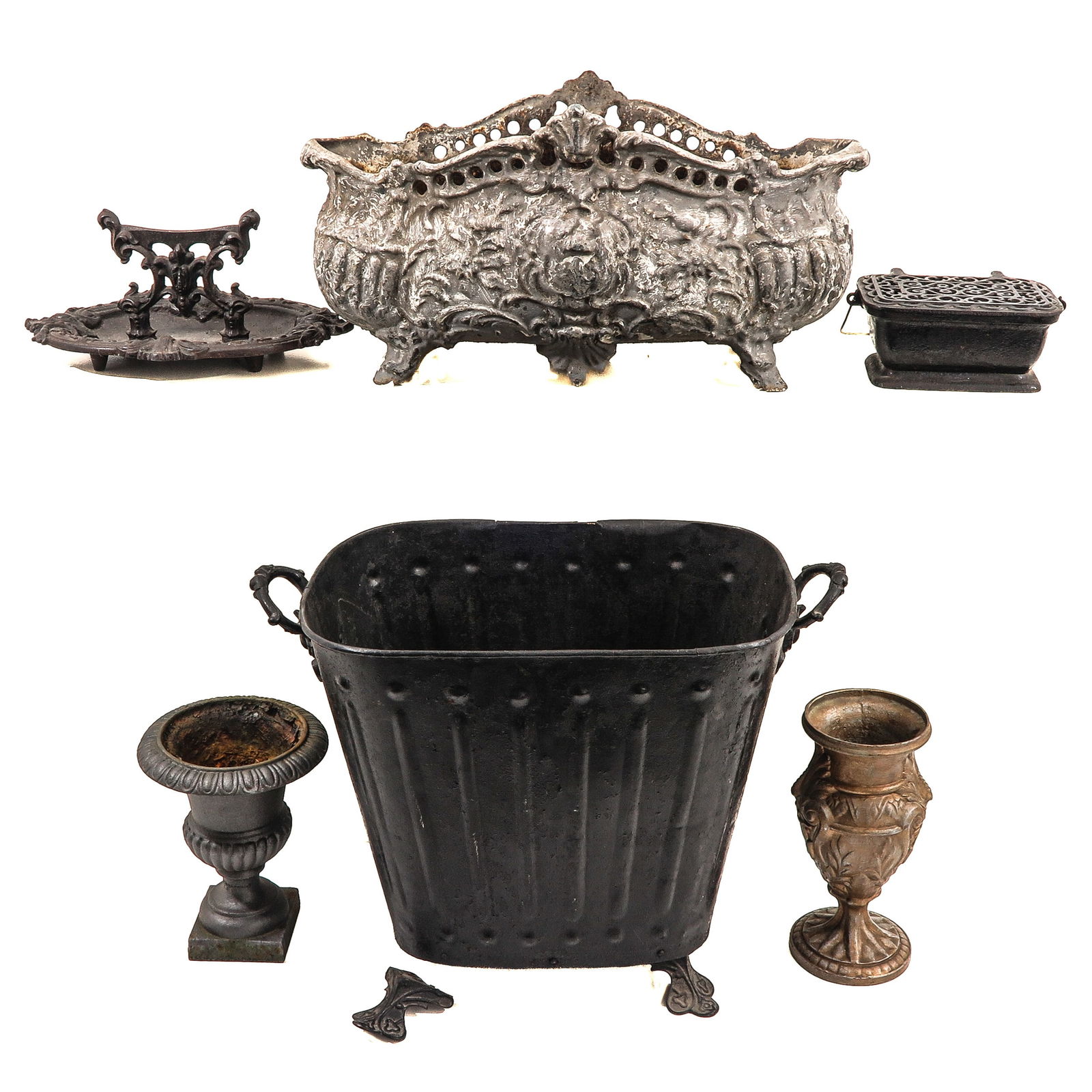 A Diverse Collection of Items: Consisting of cast iron garden and interior objects, longest 64 cm.