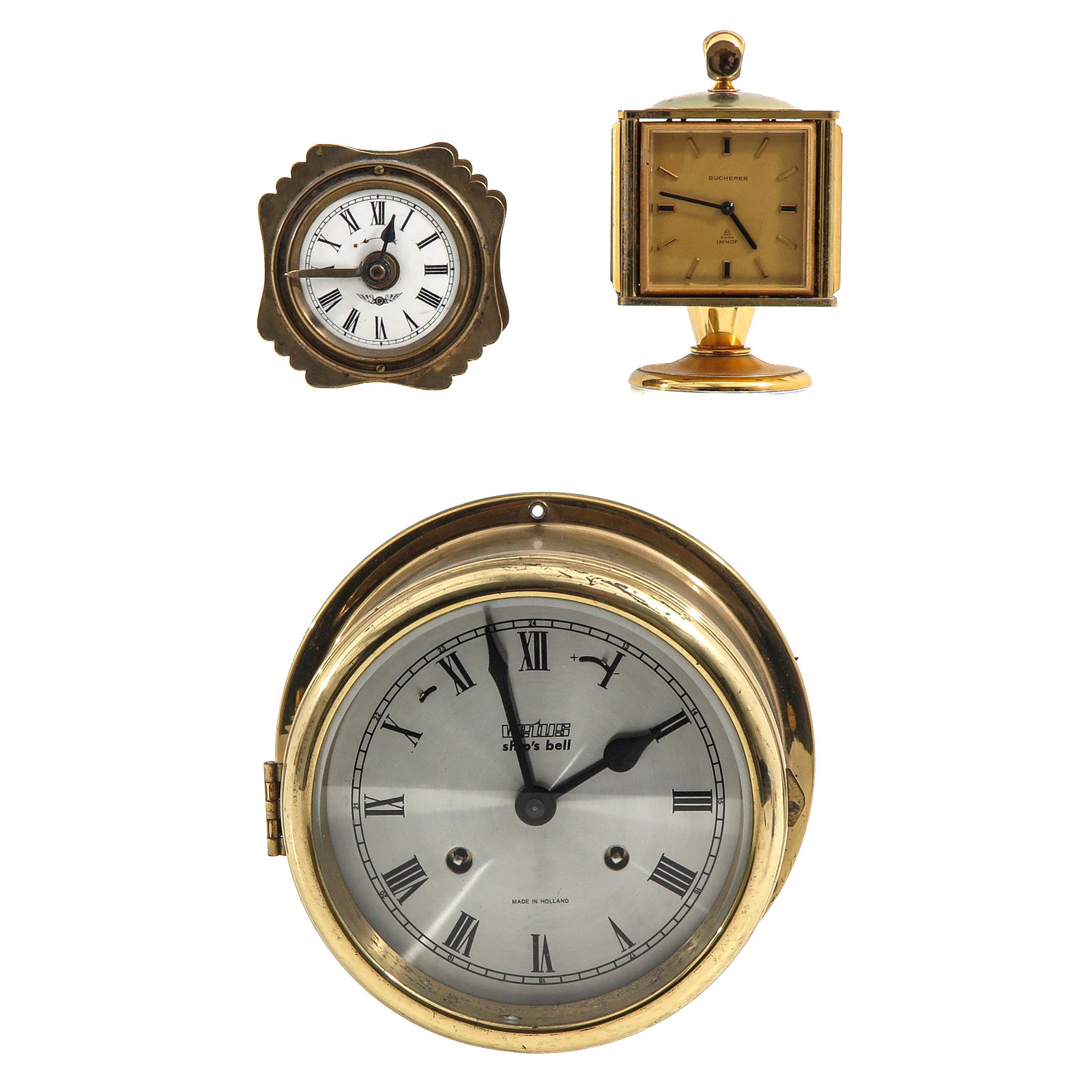 A Lot of 3 Clocks: Consisting of 3 clocks, including a Bucherer desk clock, height 12 cm.