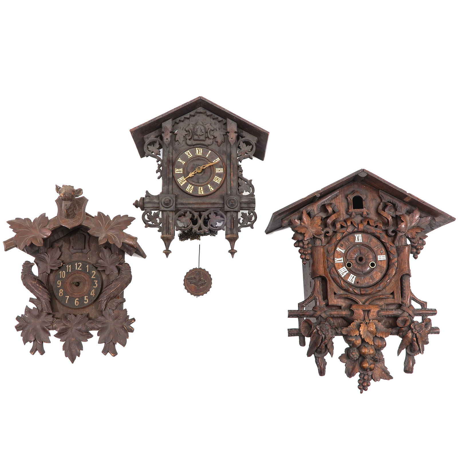 A Group of 3 Cukoo Clocks: Consisting of three cuckoo clocks, Germany, ca. 1900, tallest 54 cm.