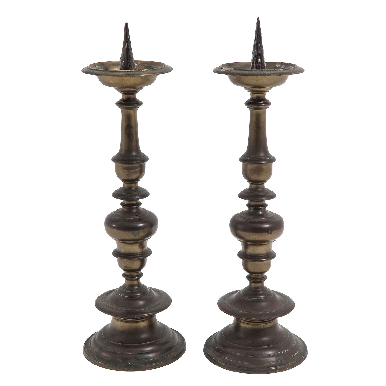 A Pair of Candlesticks: Pin candlesticks, 16th/17th century, height 40 cm.