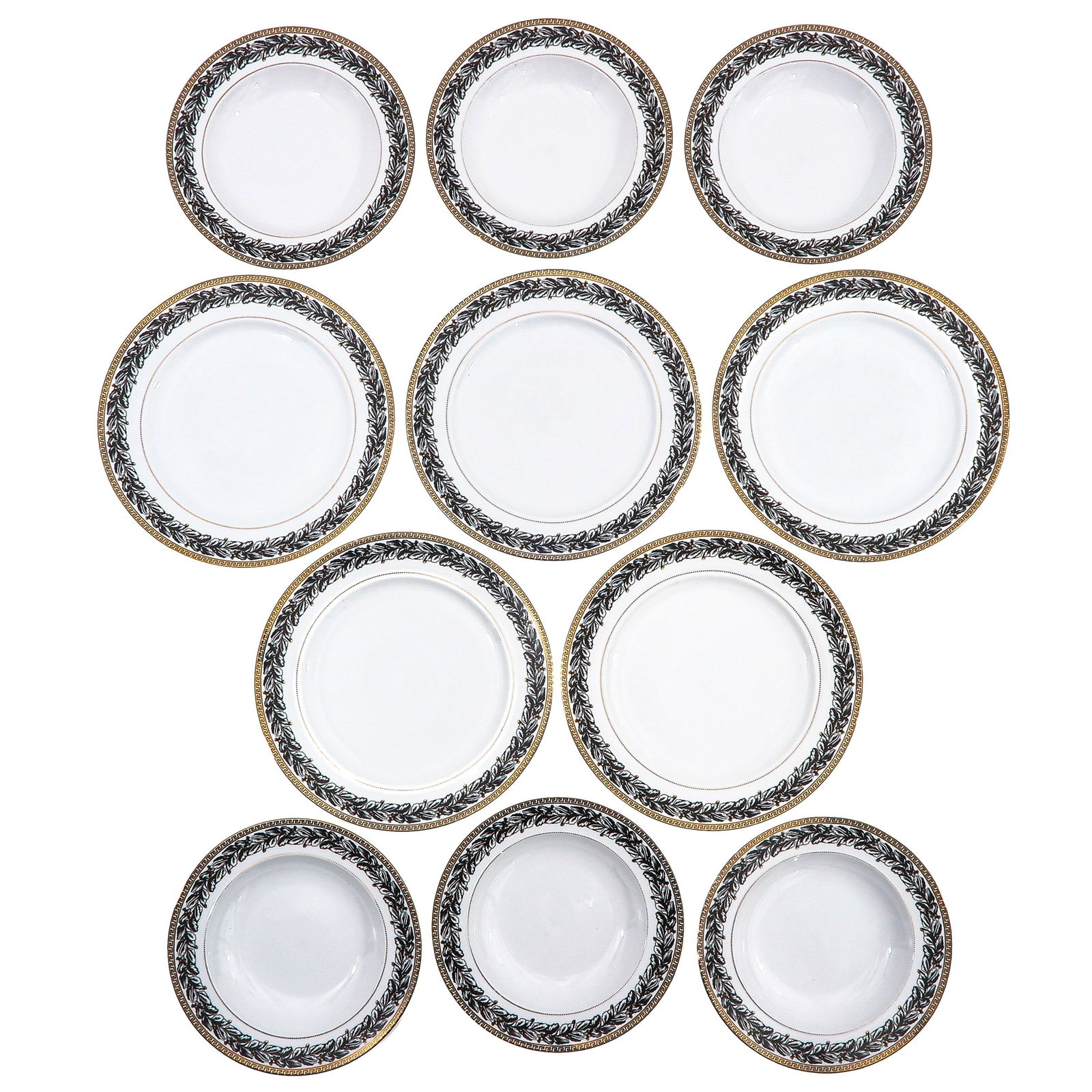 A Set of 11 Rosenthal Plates: Or 11 plates, Rosenthal, Versace Marquetry decor, diameters 27 and 23 cm.