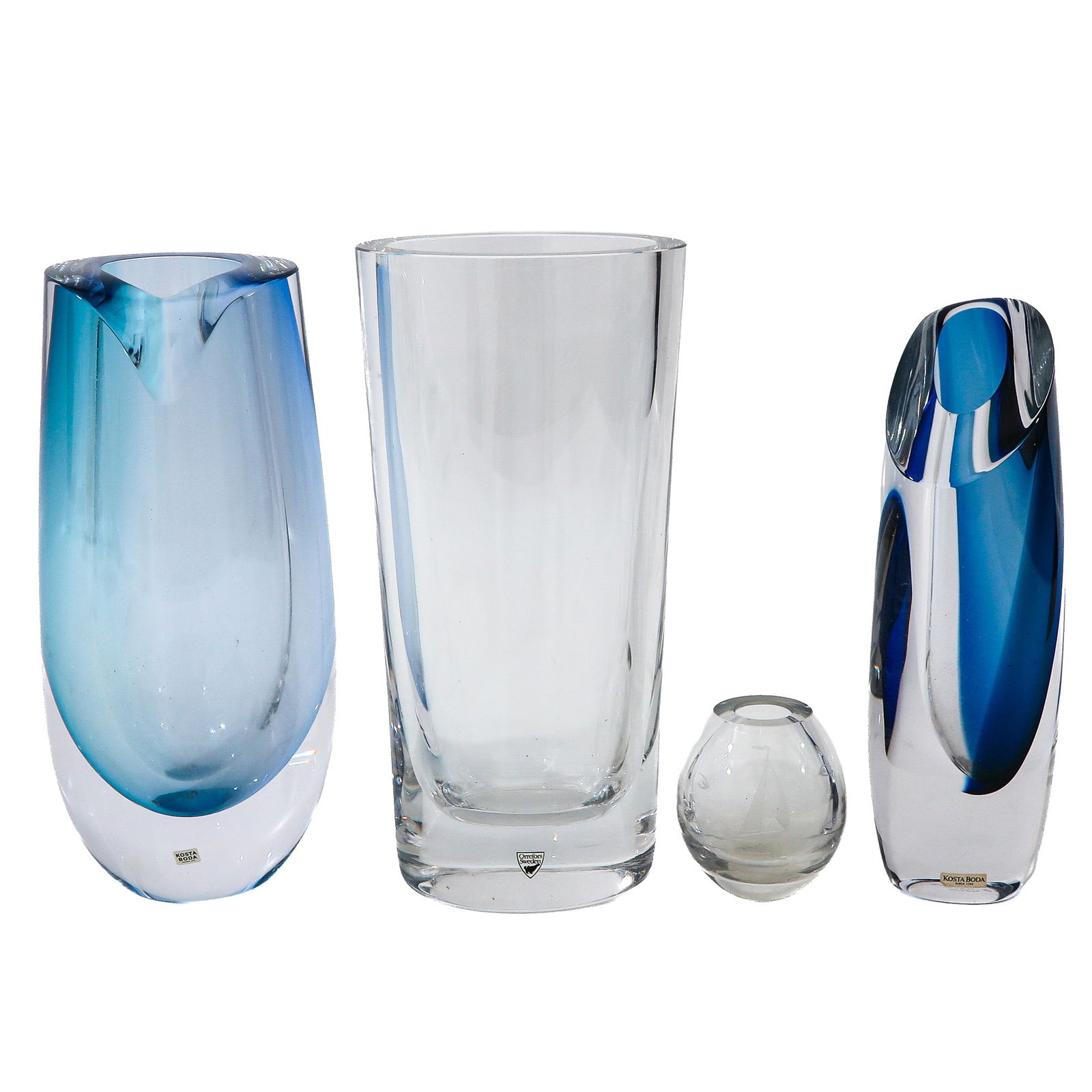 A Group of Art Glass: Consisting of four pieces of glassware, including Kosta Boda, tallest 30 cm.