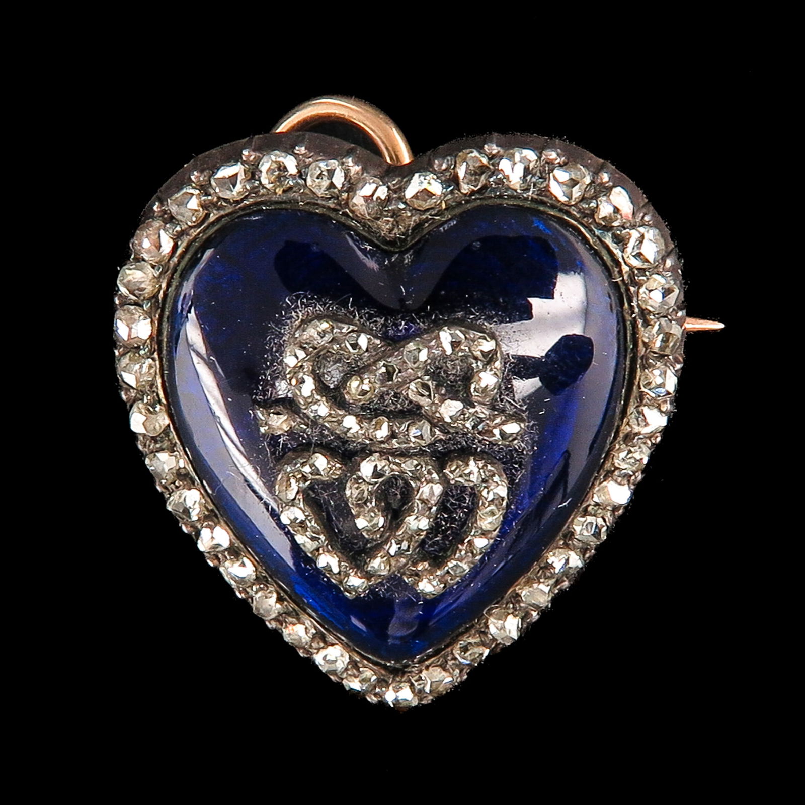 An Antique Brooch with Rose Cut Diamonds: Blue enamel, heart-shaped, set with rose-cut diamonds, with case, ca. 1890, dimensions 21 x 24 mm.