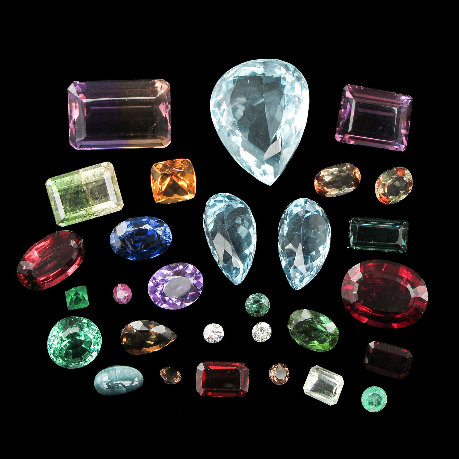 A Group of Divese Stones: including three aquamarines and other gemstones.