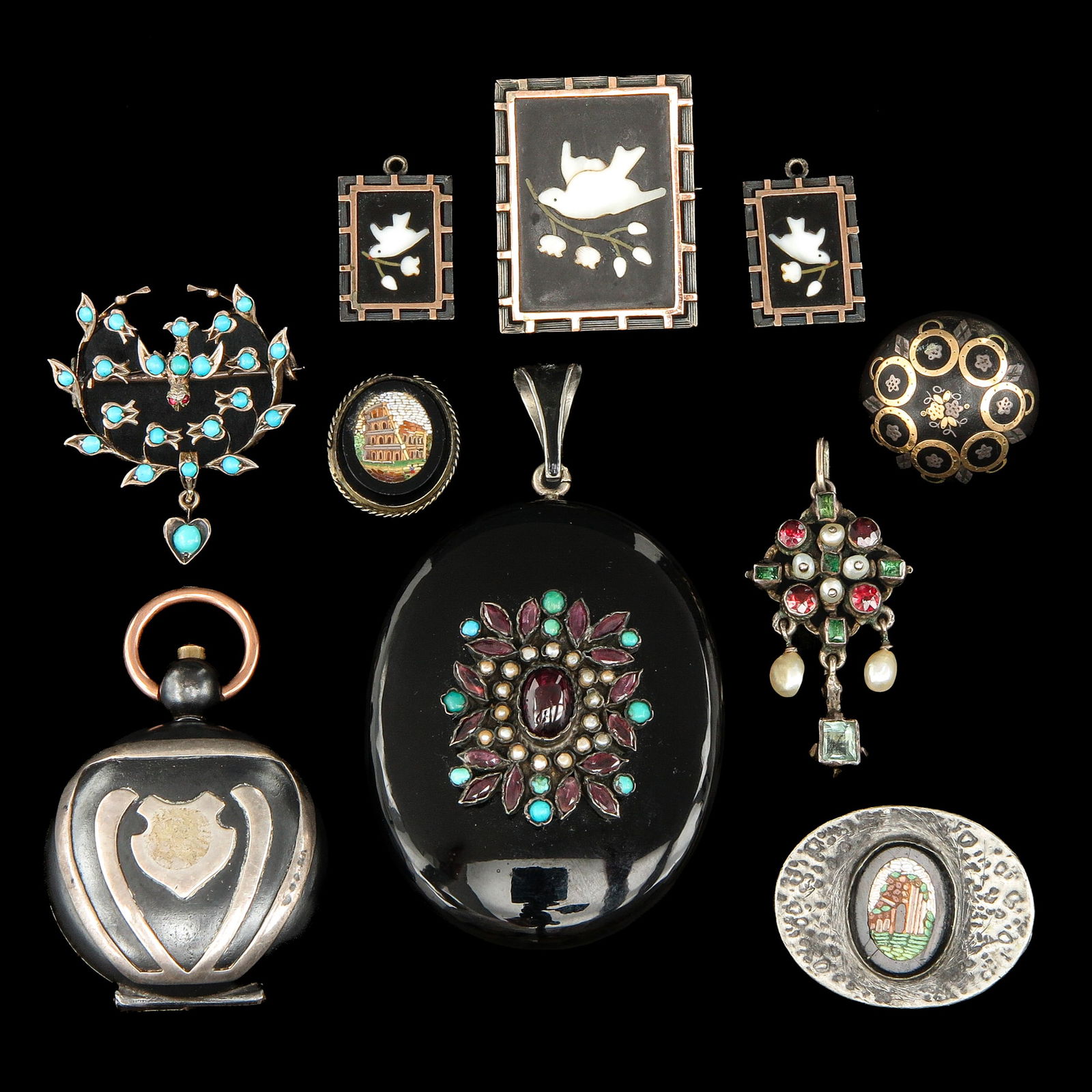 A Nice Collection of Antique Jewelry: Consisting of various jewelry pieces, including a Victorian Austro-Hungarian locket set with garnet, pearls, and turquoise, length 52 mm.