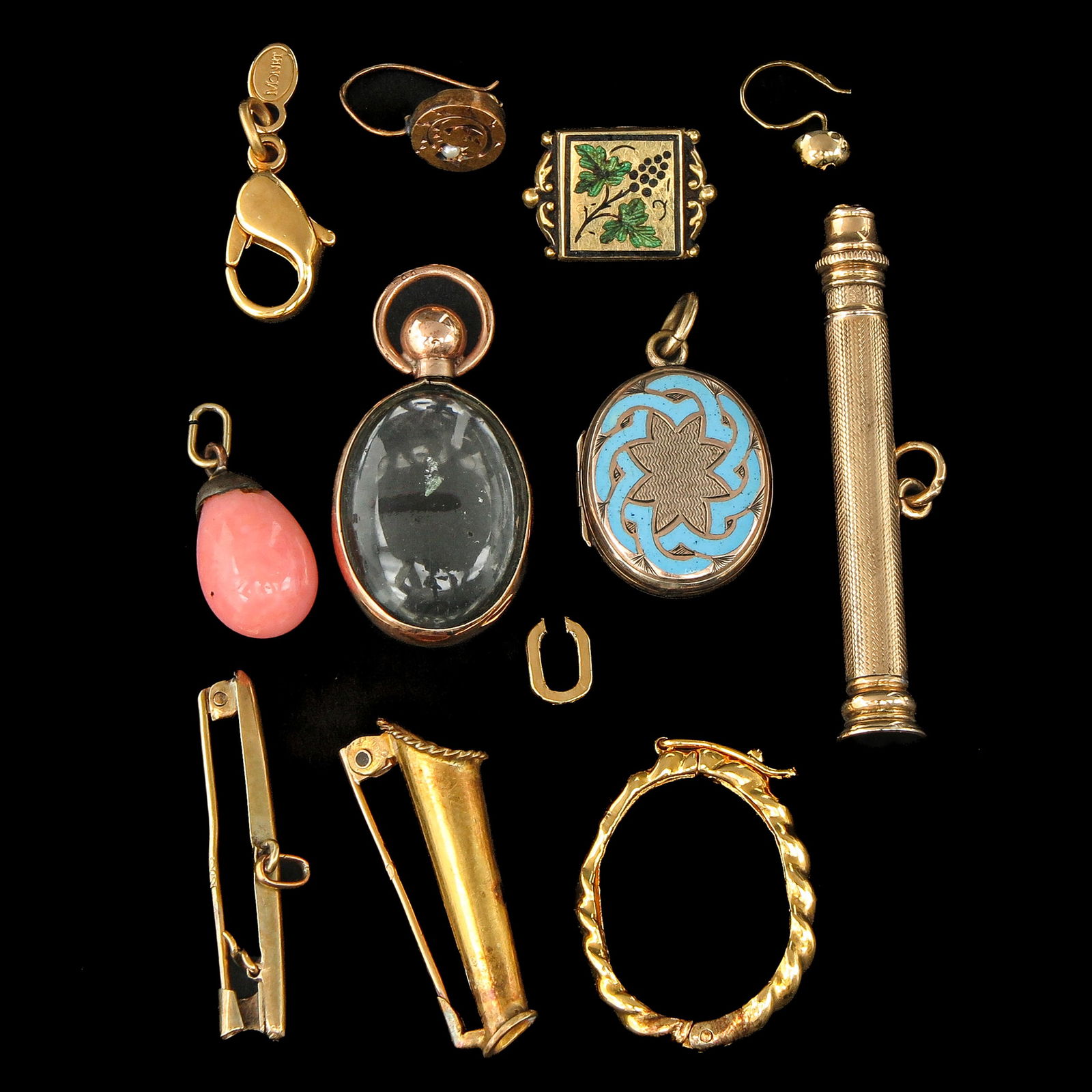 A Group of Jewelry and Accessories: Various jewelry accessories, including a 9-karat magnifying glass pendant, 29 mm