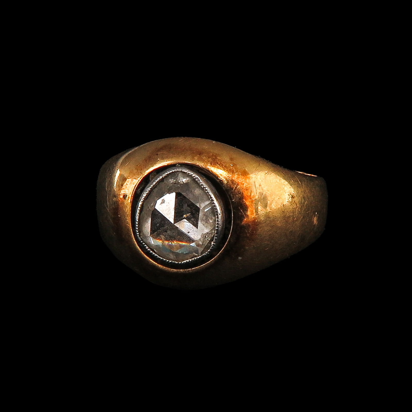 A Diamond Ring: 18-karat gold, Victorian period, set with rose-cut diamond of approximately 6 mm in diameter, ring size 18.5.