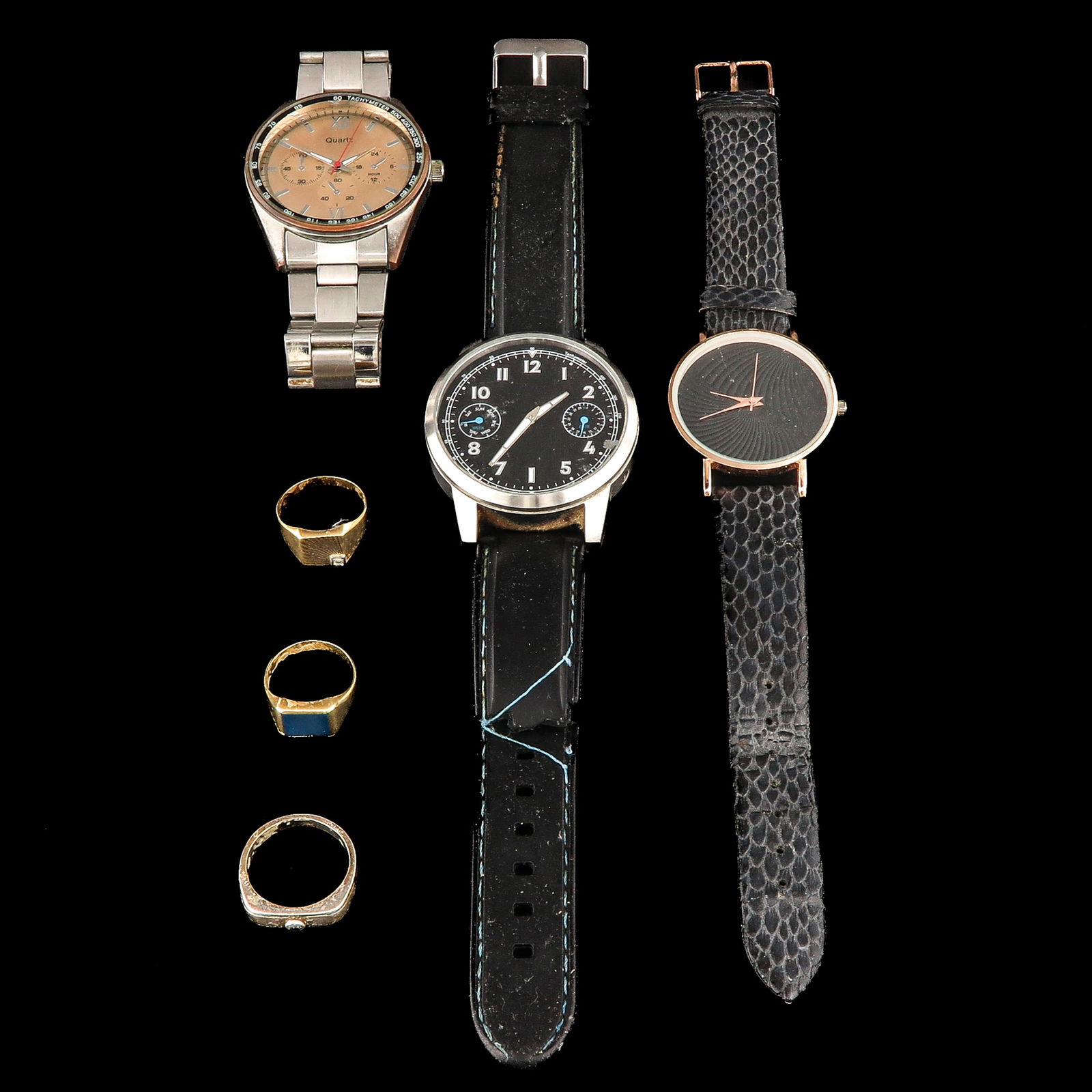A Group of Watches and Rings: Consisting of 3 wristwatches and 3 rings, including 2 pieces in 14-karat gold.