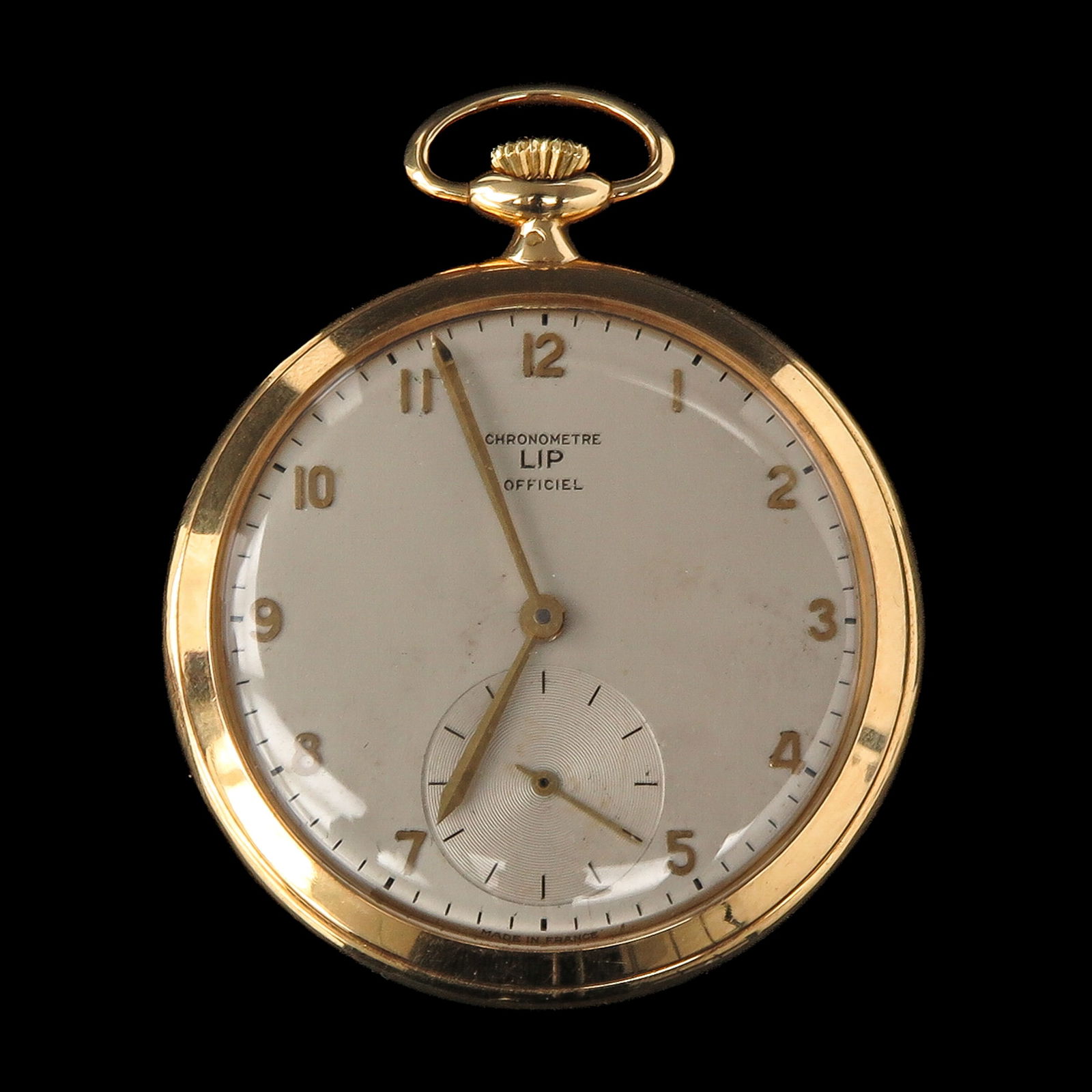 An 18KG Pocket Watch: 18-karat gold, signed LIP, Chronometre Officiel Bescauçon, France, ca. 1930, diameter 47 mm.