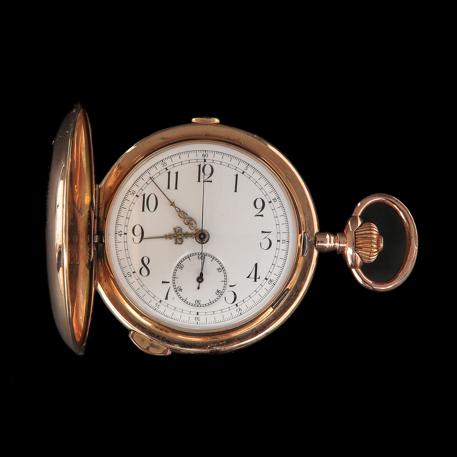 A 14KG Stop Watch: 14-karat gold, diameter 60 mm
