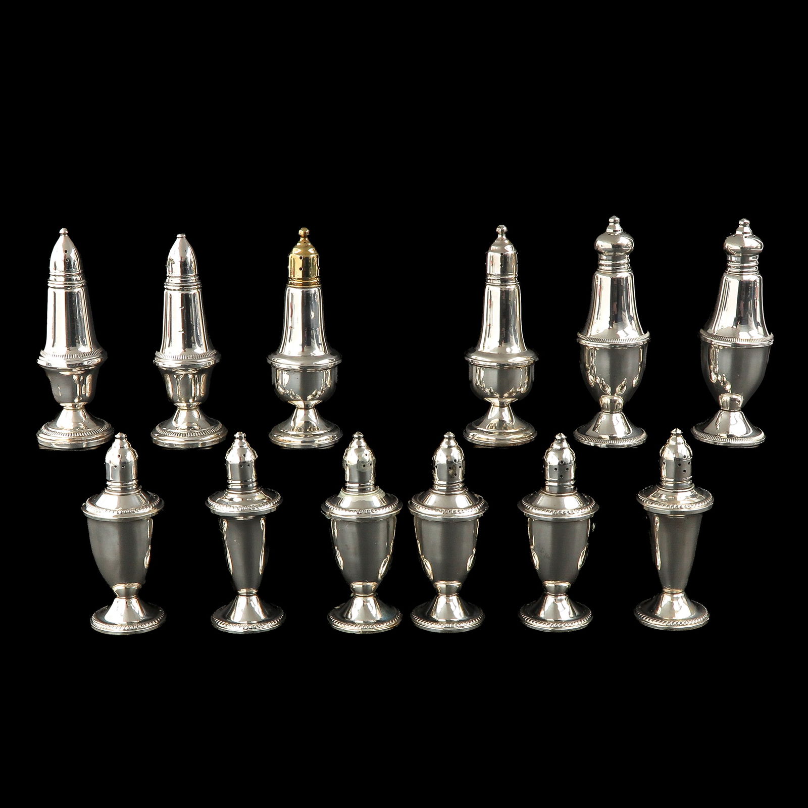 A Group of Silver Salt and Pepper Castors (1 of 10)
