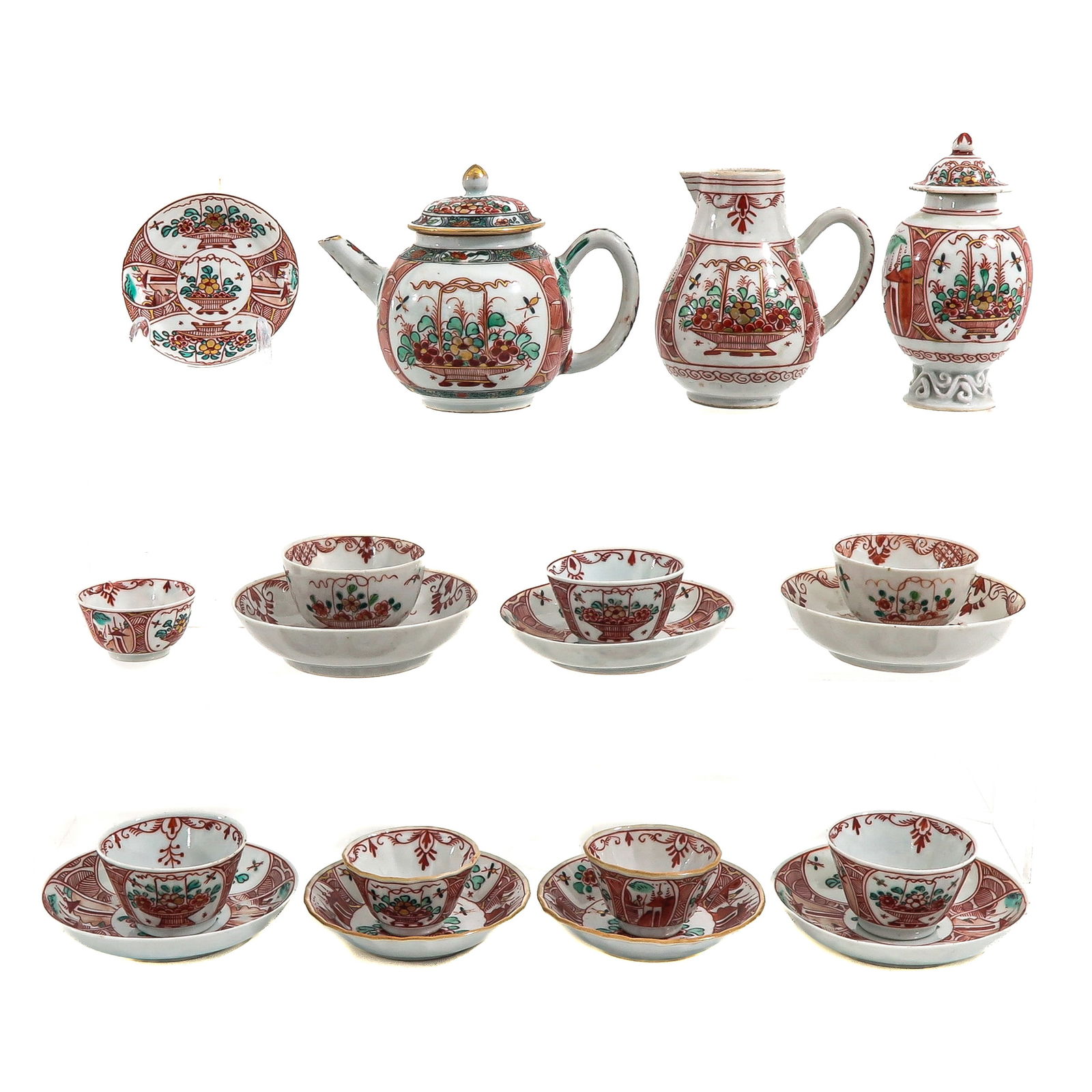 A Tea Service: Decorated with baskets of flowers, 18th Century, teabox is 11 cm. tall, in diverse conditions.