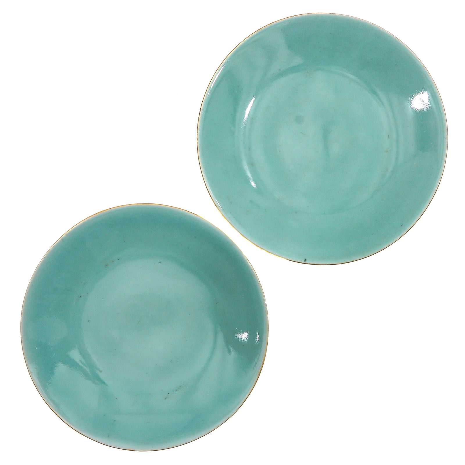 A pair of Turqouoise Glazed Bowls: 26 cm. in diameter, chip.