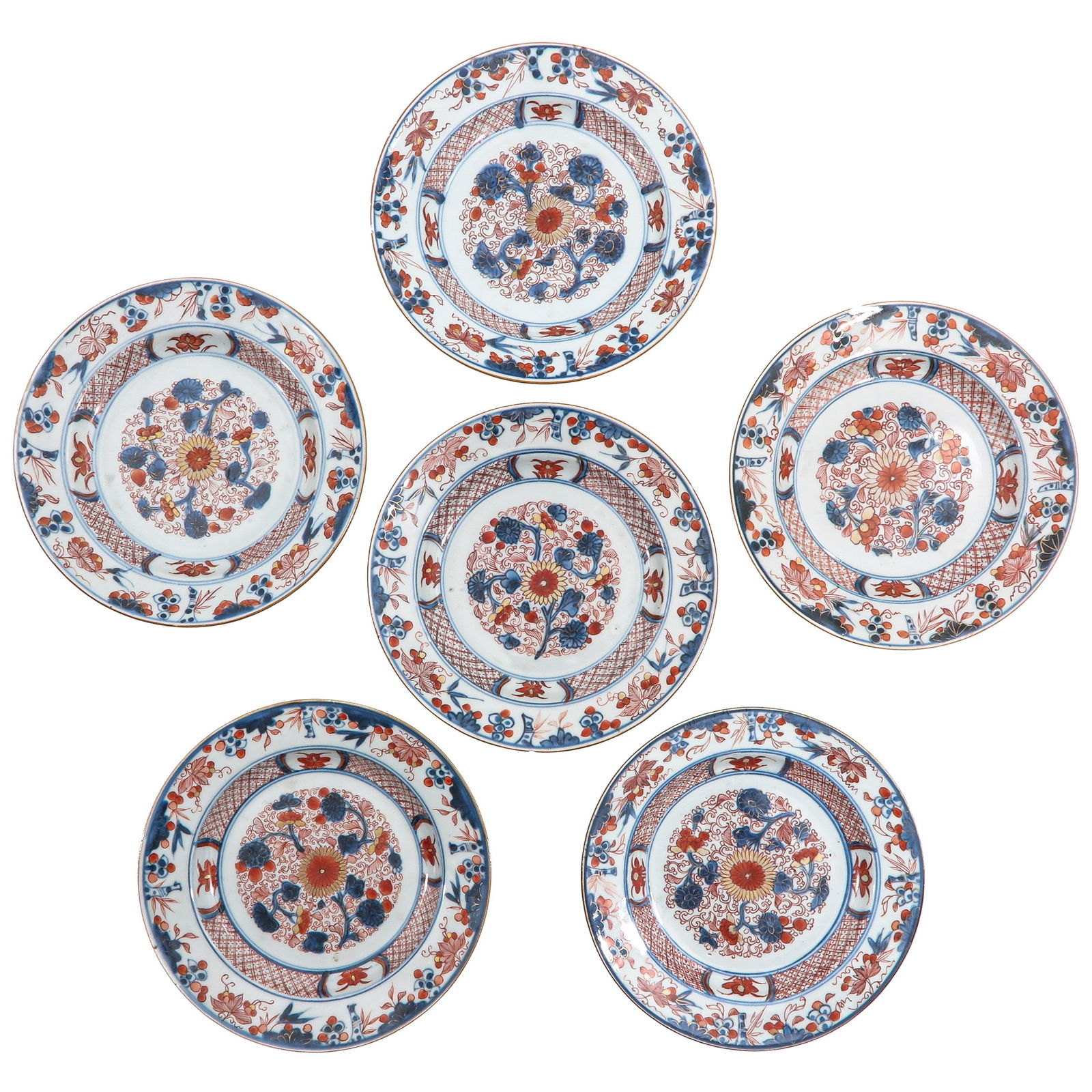 A Series of 6 Imari Plates: Floral motif, 18th Century, 22 cm. in diameter, chip.