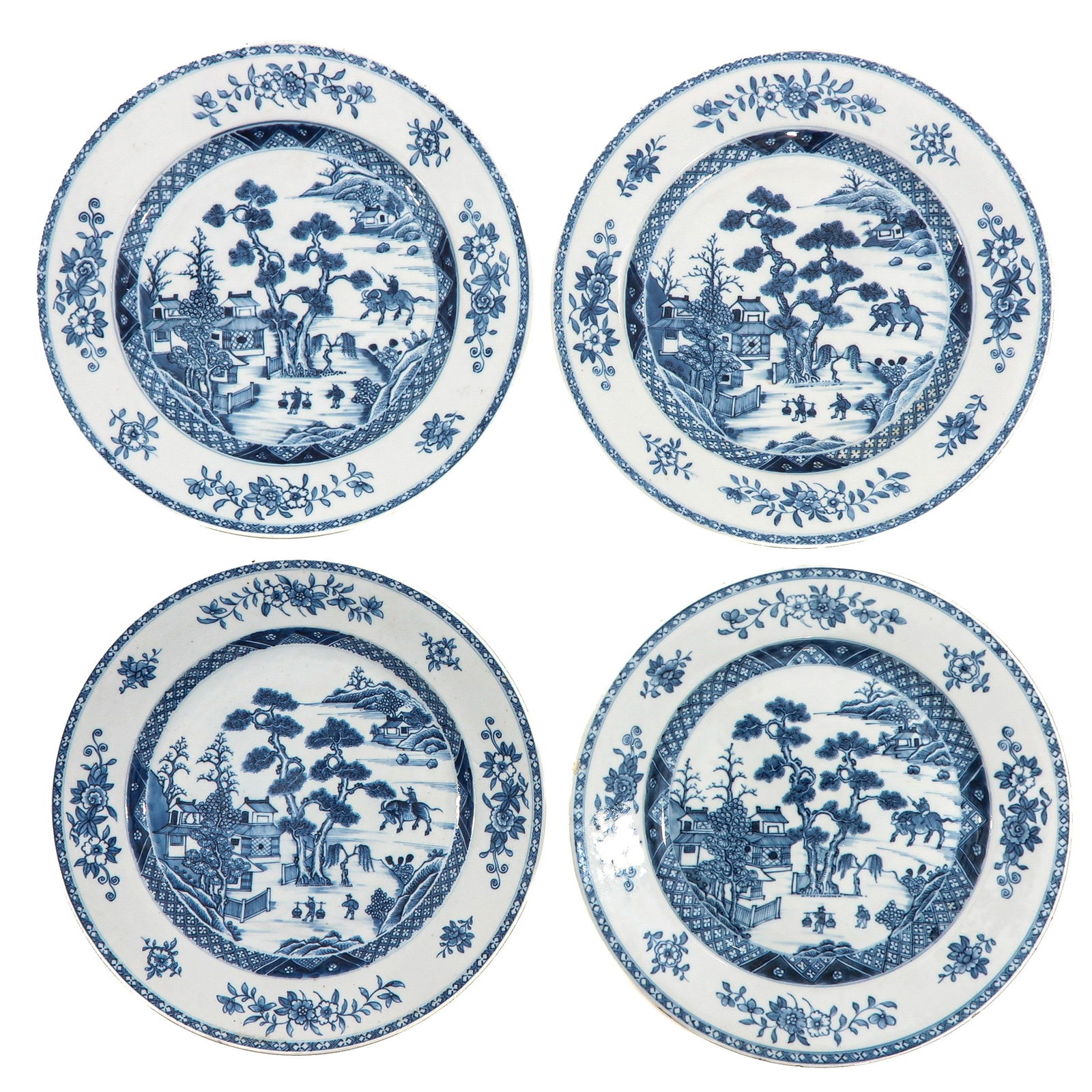A Series of 4 Blue and White Plates: Each decorated with a river landscape featuring pavilions, trees, and figures, 18th Century, 29 cm. in diameter, in diverse conditions.