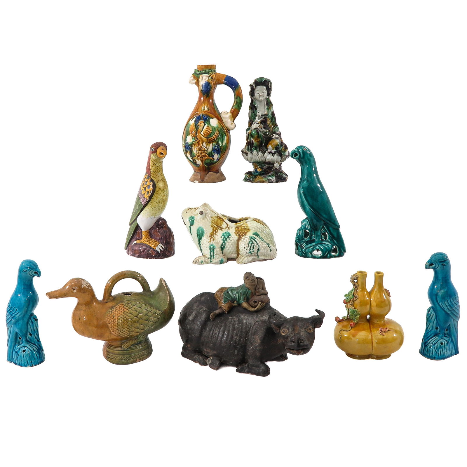 A Group of 10 Sculptures: Incluing animal sculptures and Quanyin, figural duck pitcher is 29 cm. tall, in diverse conditions.