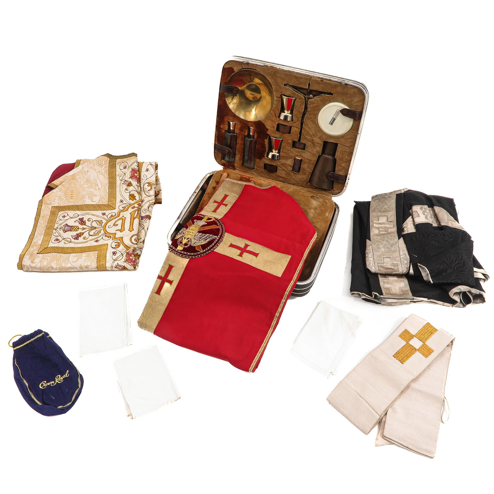 A Priest Traveling Set: With complete religious attire, including clothing and tableware.