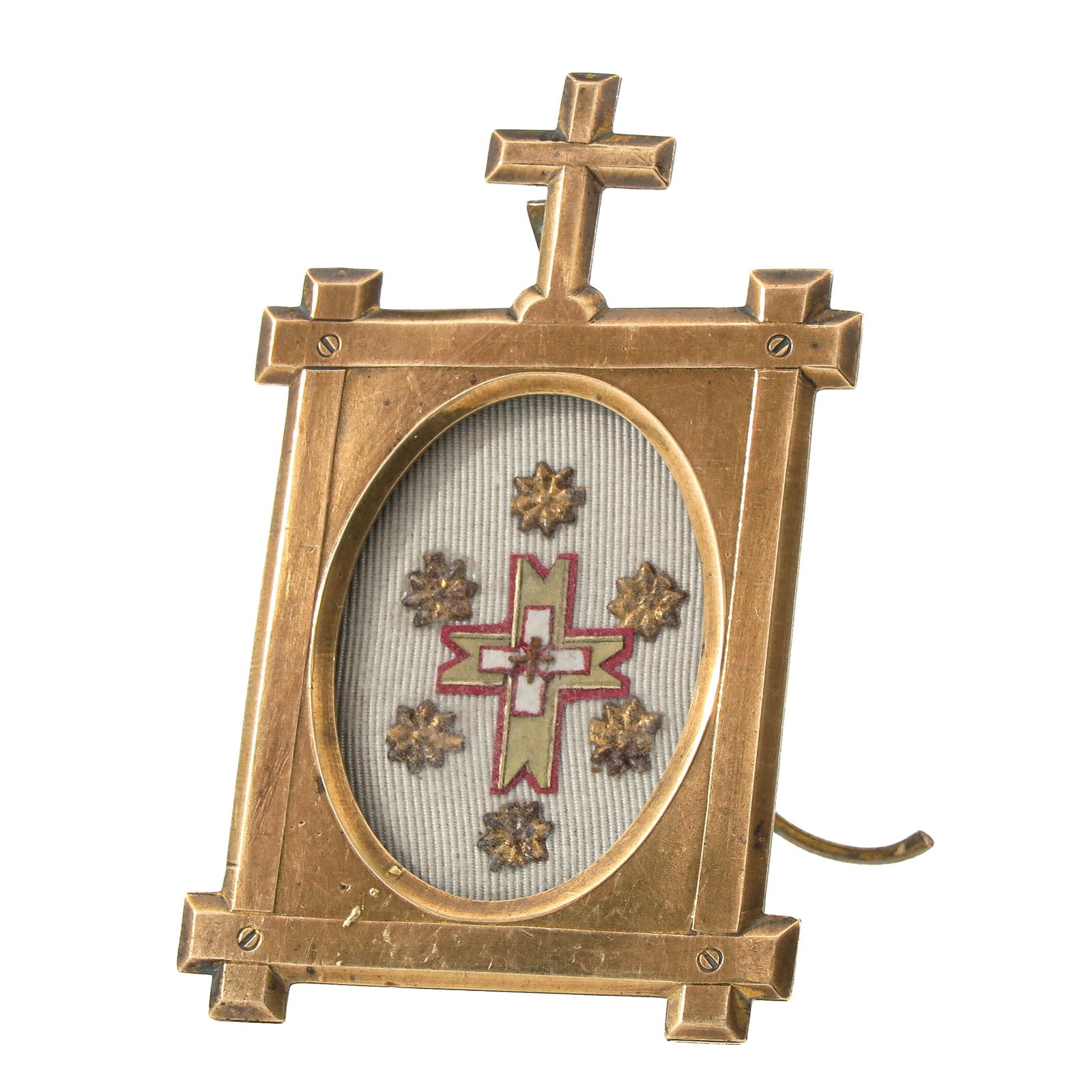 A Standing Reliquary Frame: Containing a relic of the Holy Cross, height 9 cm. You are purchasing the theca; the relics are a gift.