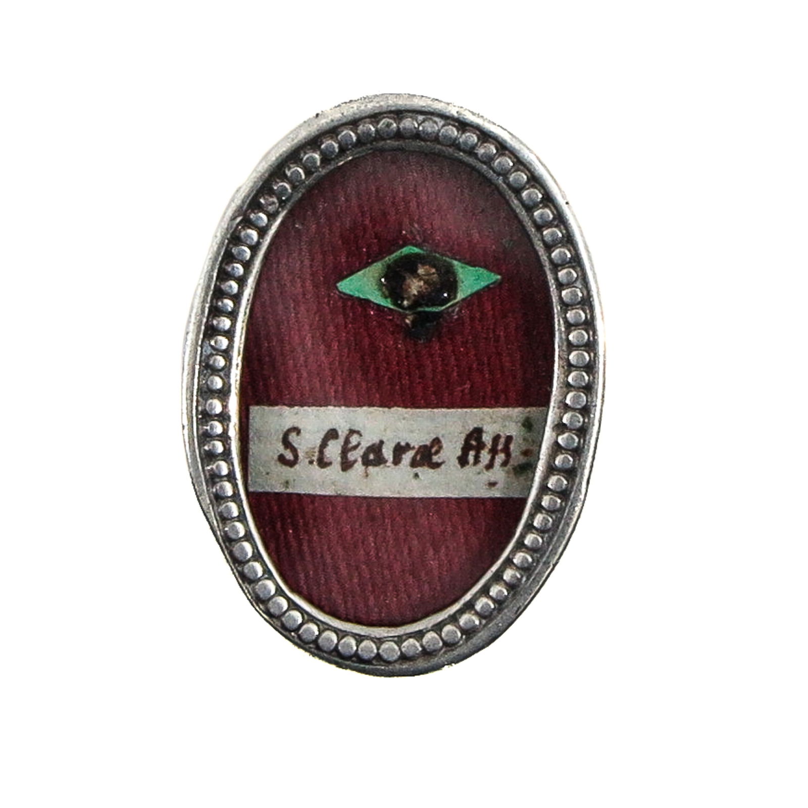 A Sealed Theca: Silver, containing the relic of Saint Clare of Assisi, virgin (patroness of television and eye diseases), length 2.5 cm. You are purchasing the theca; the relics are a gift.