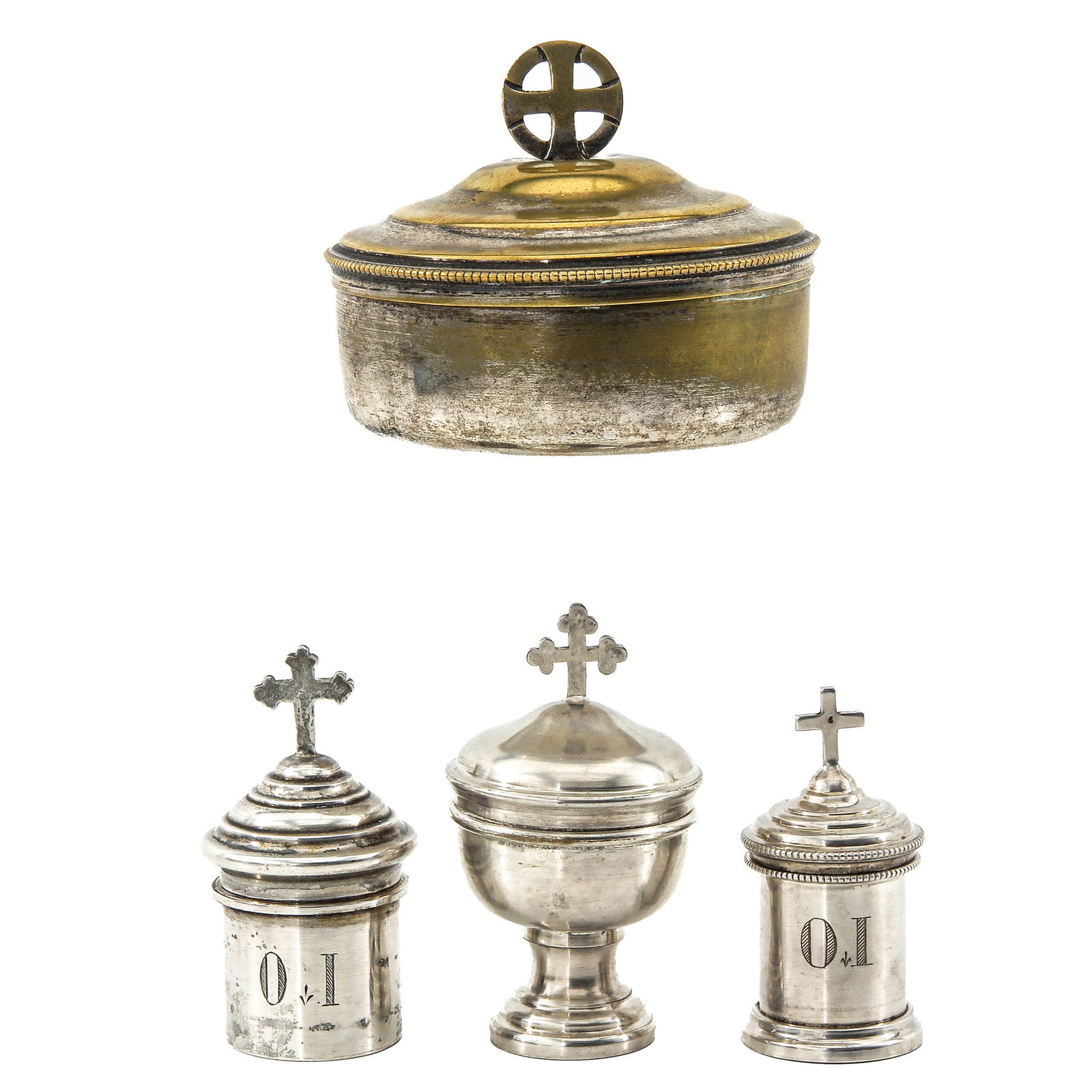 A Group of Religious Objects: Consisting of 4 pyxis and a chrismarium, including 3 silver ones, height 8 cm.
