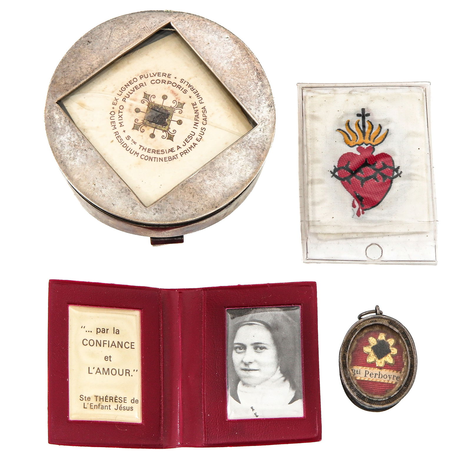 A Group of Devotional Objects: Consisting of 4 devotional objects, including a reliquary with a relic of Saint Theresa the Infante and a relic of Saint Peter Borie. You are purchasing the holder; the relics are a gift.