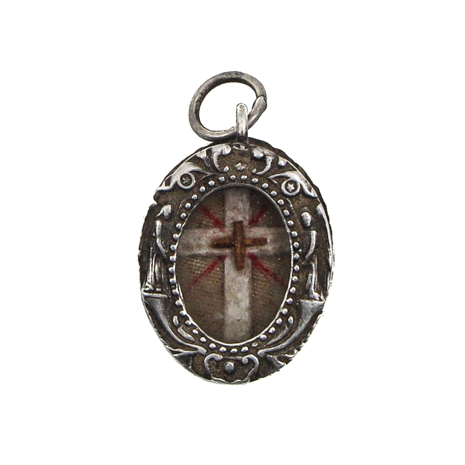 A Sealed Reliquary: Containing a relic of the Holy Cross, 1.5 cm long. You are purchasing the theca; the relics are a gift.