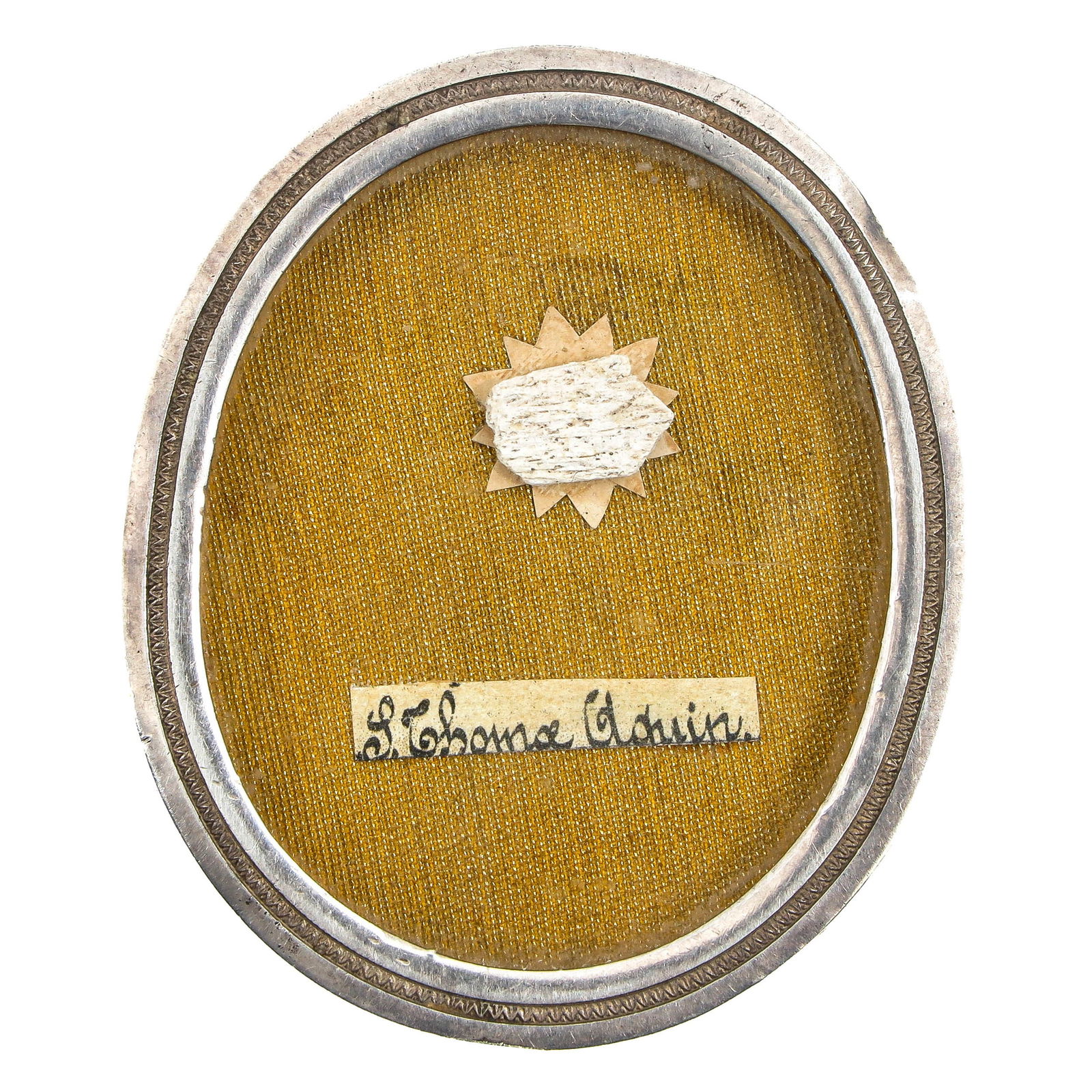 A Kiss Relic: Containing a relic of Saint Thomas Aquinas, confessor and Doctor of the Church (patron of theologians, students, and universities), length 9 cm. You are purchasing the theca; the relics are a gift.