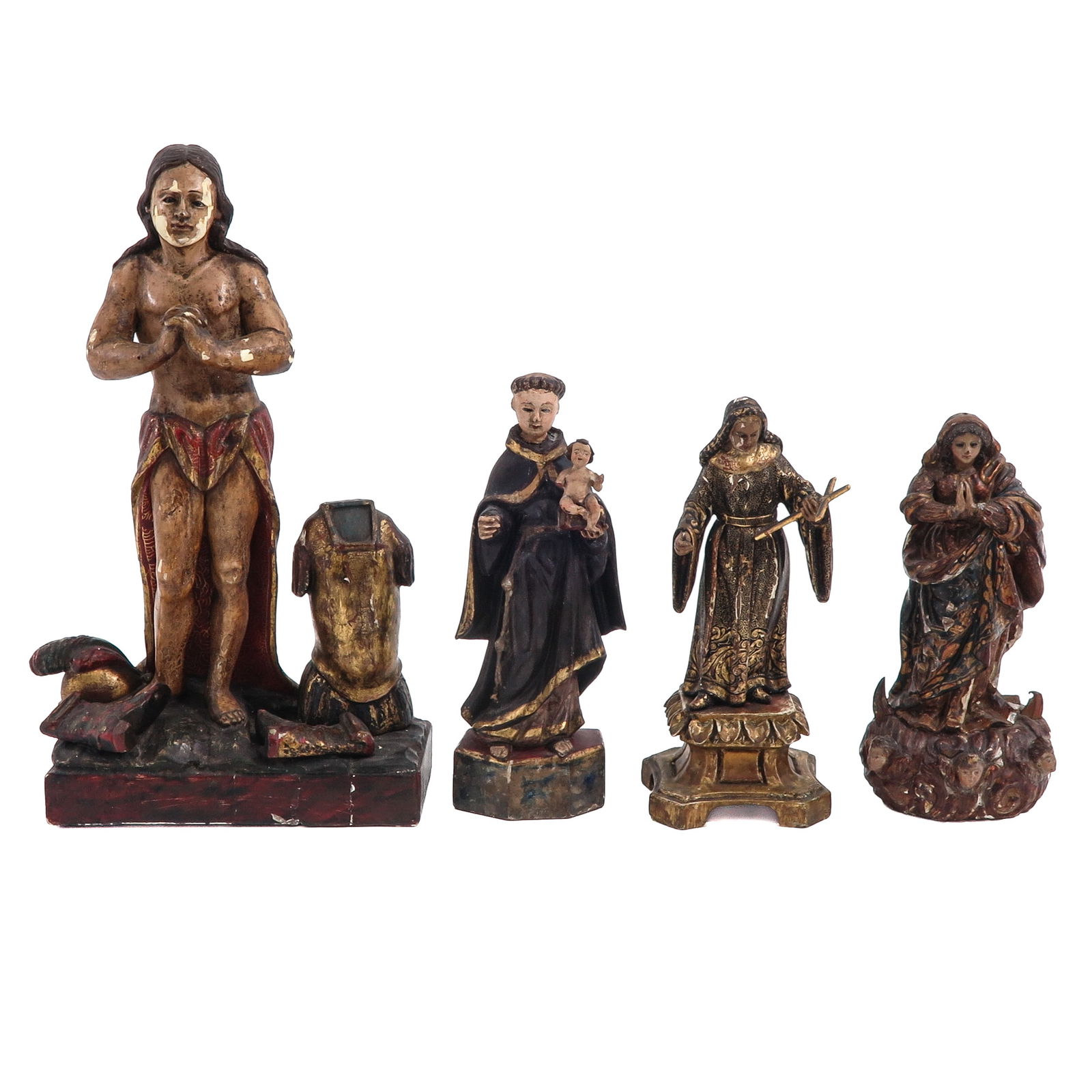 A Group of 4 Sculptures: Consisting of 4 polychrome wooden holy statues, 18th/19th century, including Saint Sebastian, height 40 cm.