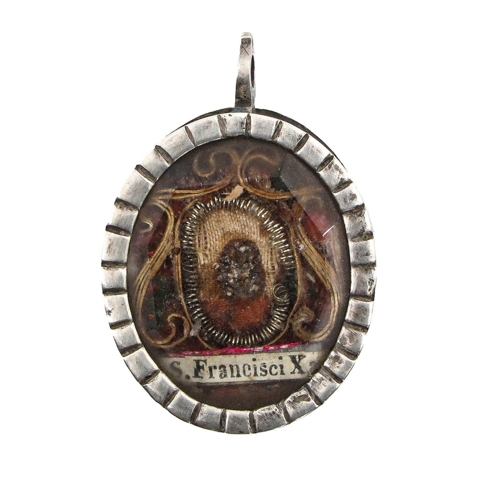 A Sealed Reliquary: Containing a relic of Saint Francis Xavier, Jesuit and missionary (patron of missions and missionaries), length 4 cm., with certificate. You are purchasing the theca; the relics are a gift.