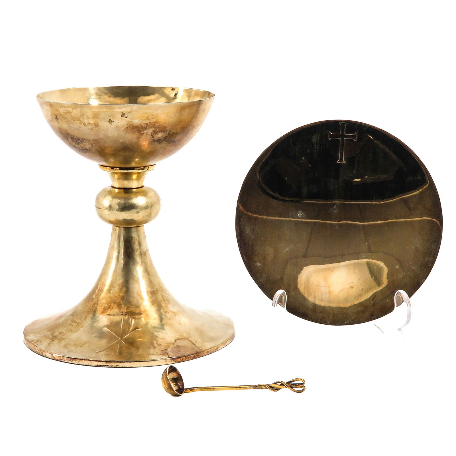 A Chalice: With silver paten and spoon, cuppa is gilded silver, with case, height 18 cm.