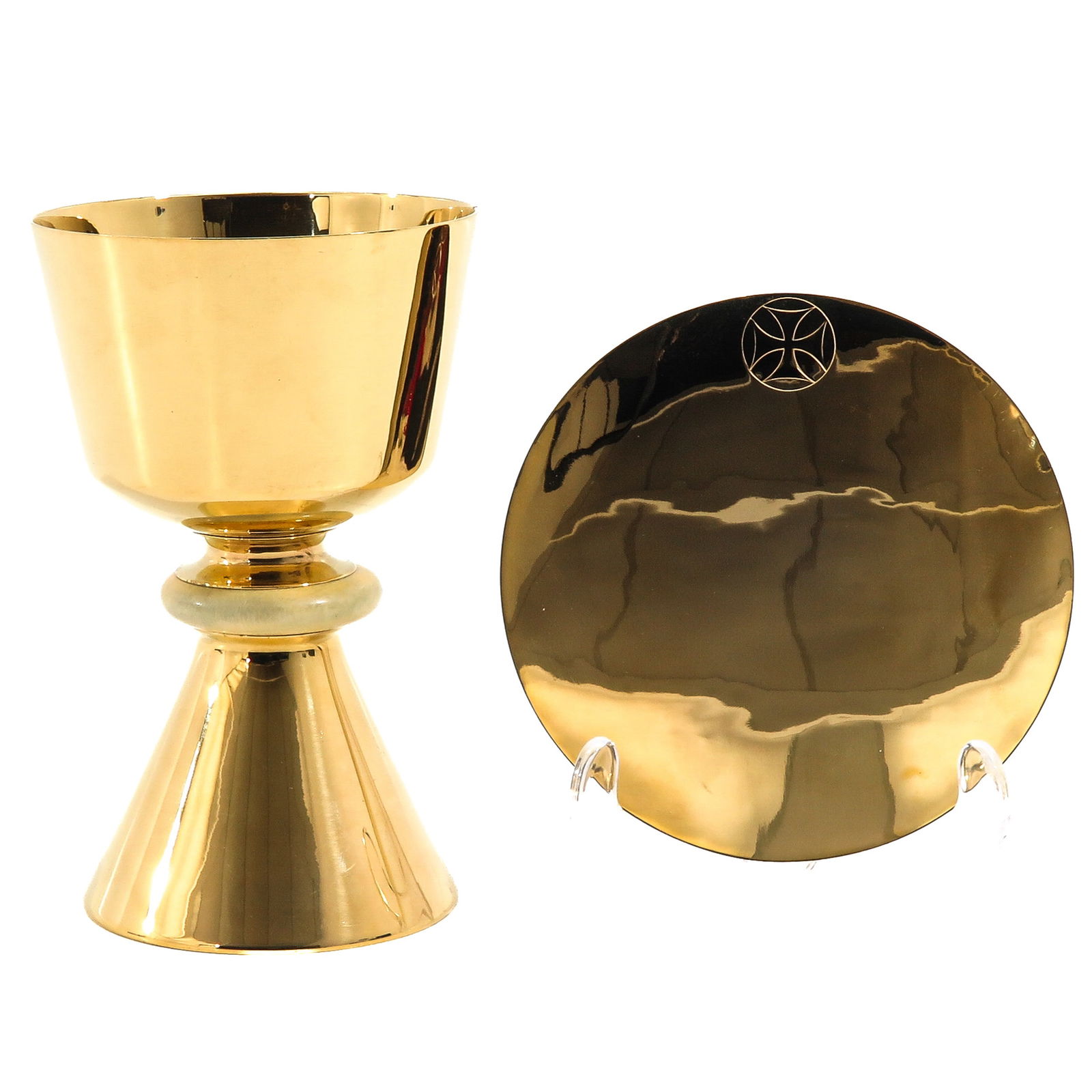 A Chalice: With paten, gilded with 1st-grade carved silver, with case, height 16 cm.