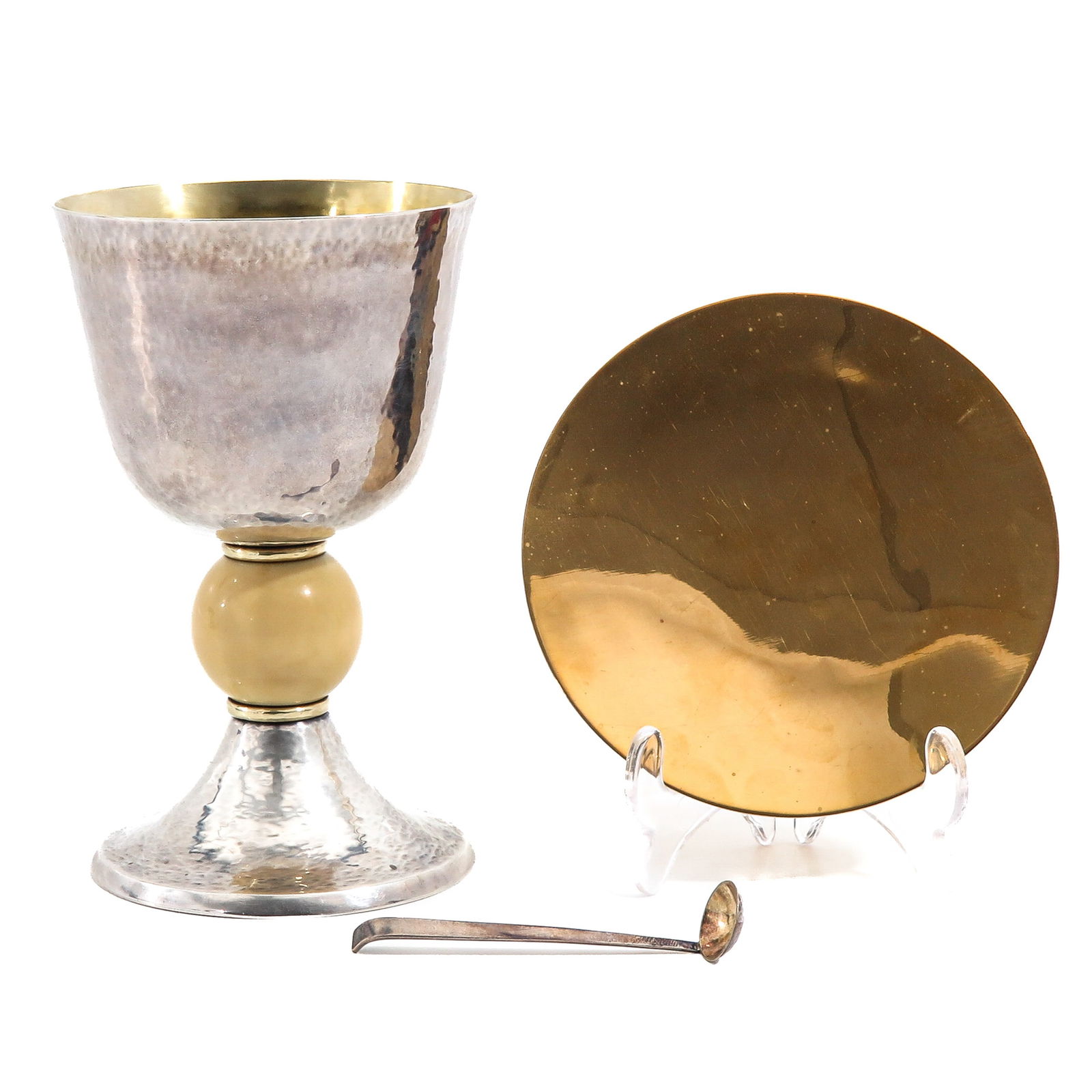 A Chalice: With paten and spoon, gilded second-grade silver cuppa and gilded first-grade silver paten, height 18 cm.