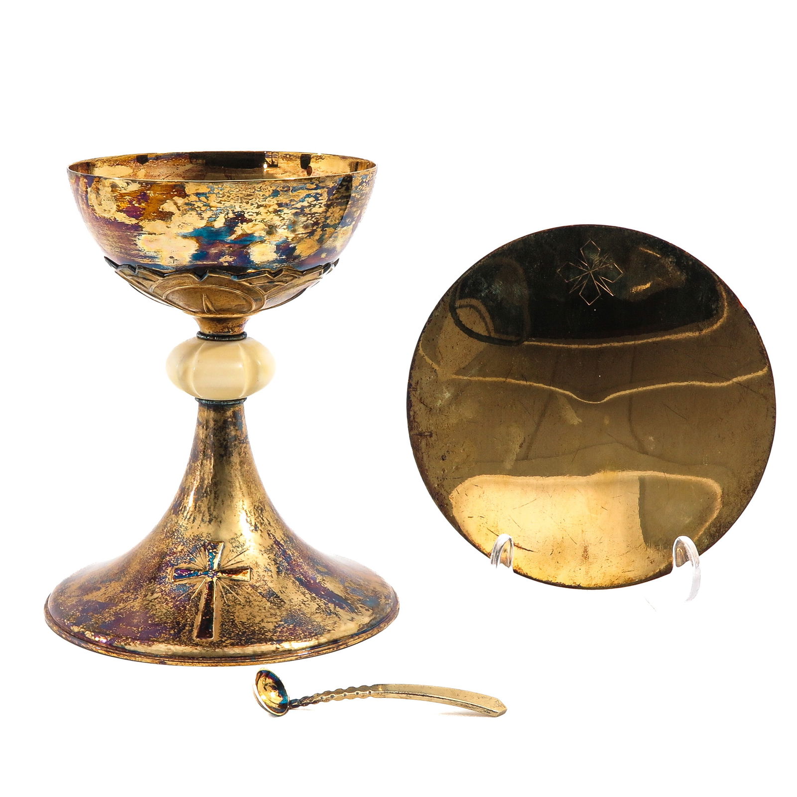 A Chalice: With paten and spoon, fully gilded in second-grade silver, date letter "q," with case, height 20 cm.