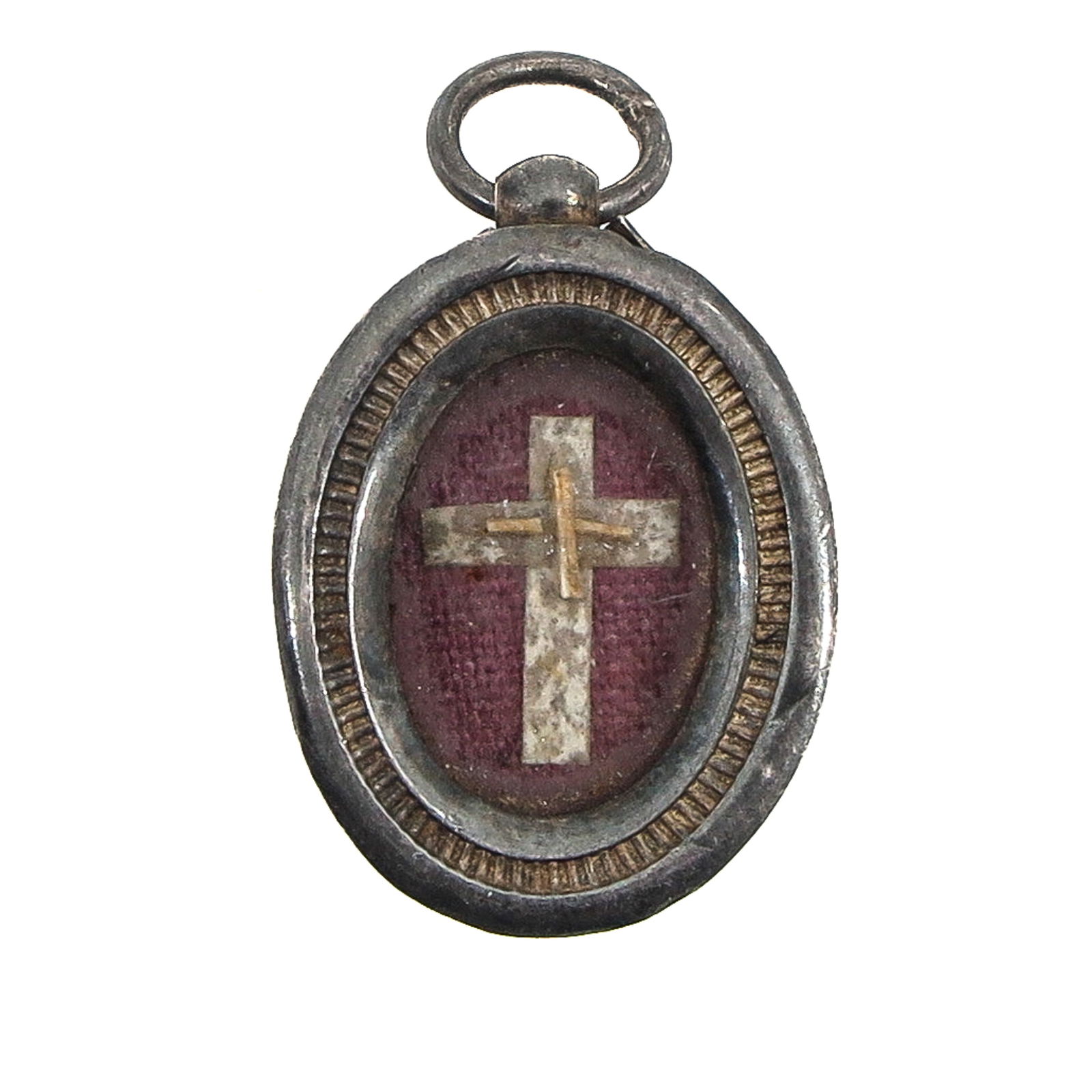 A Sealed Reliquary: Silver, containing a relic of the Holy Cross, length 2.5 cm. You are purchasing the theca; the relics are a gift.