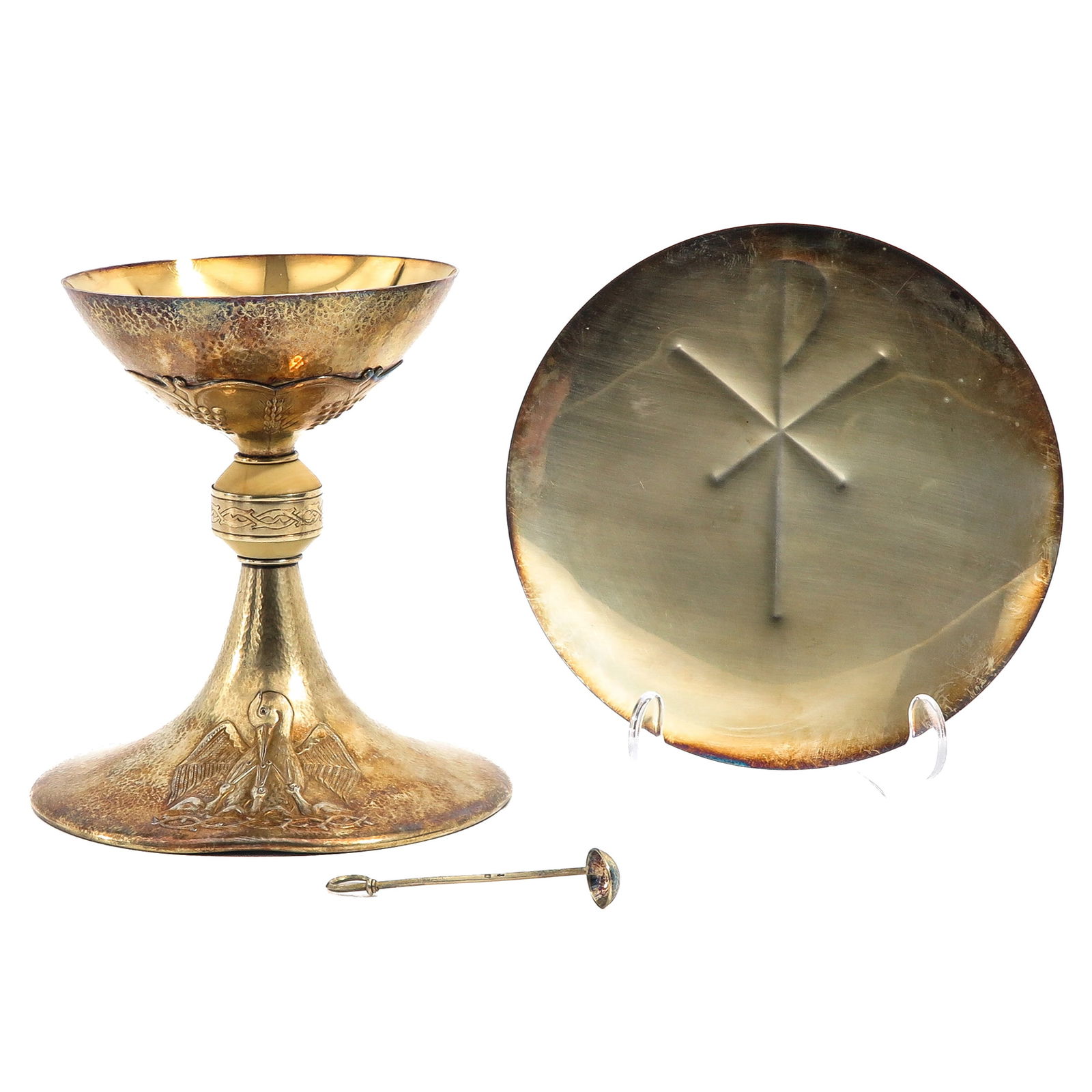 A Chalice: With paten and spoon, Art Deco. Cuppa is gilded silver, with case, height 17 cm.