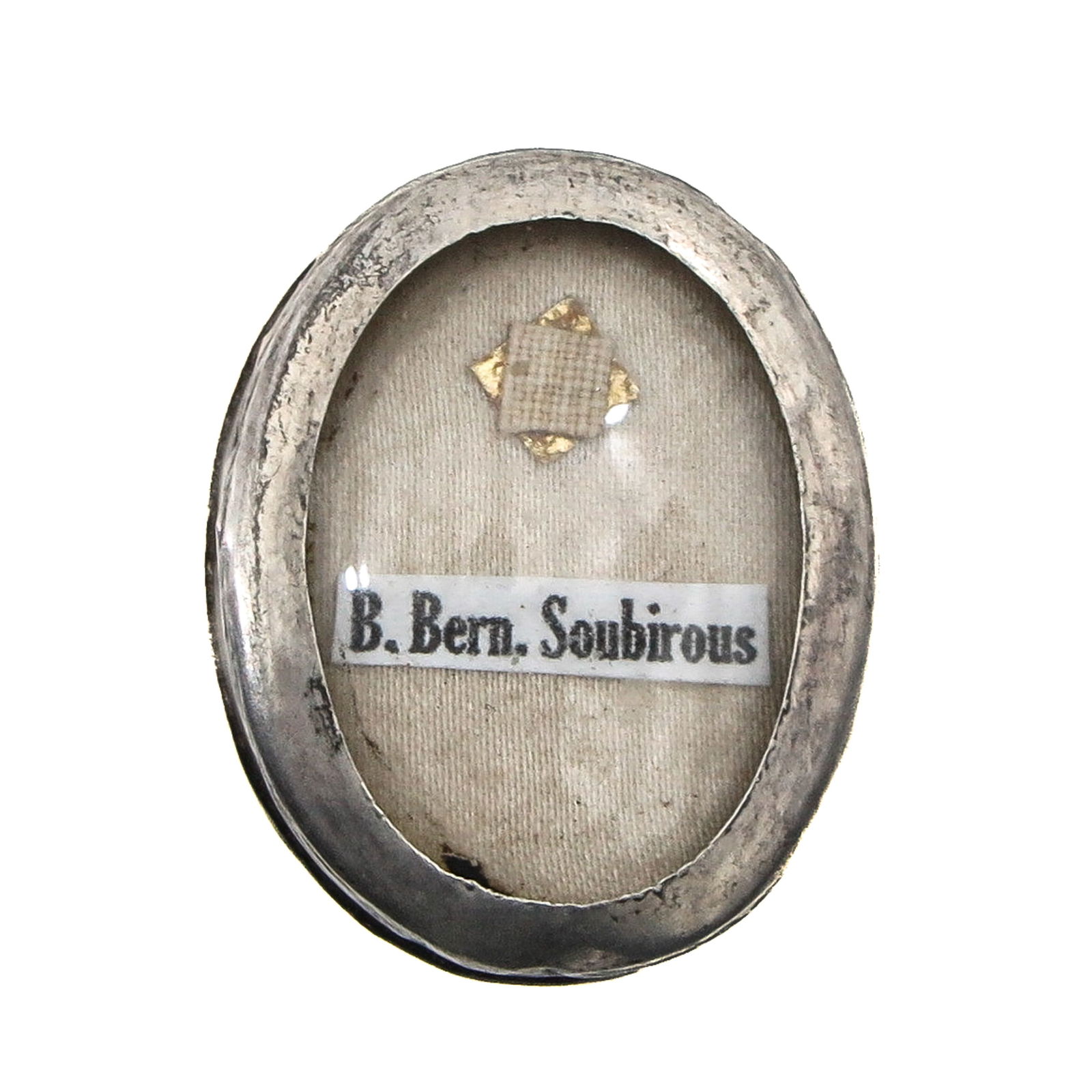 A Sealed Theca: Silver, containing a relic of Bernadette Soubirous (patron saint of Lourdes and the sick), length 3.5 cm. You are purchasing the theca; the relics are a gift.