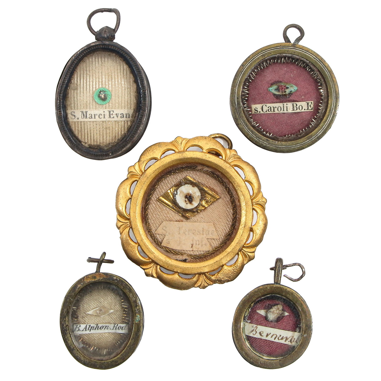 A Group of 5 Reliquary Pendants: Consisting of five reliquary pendants, containing relics of Blessed Alfonso Rodriguez (patron of lay brothers and of humility) and Saint Mark the Evangelist (patron of writers, notaries, and Venice),