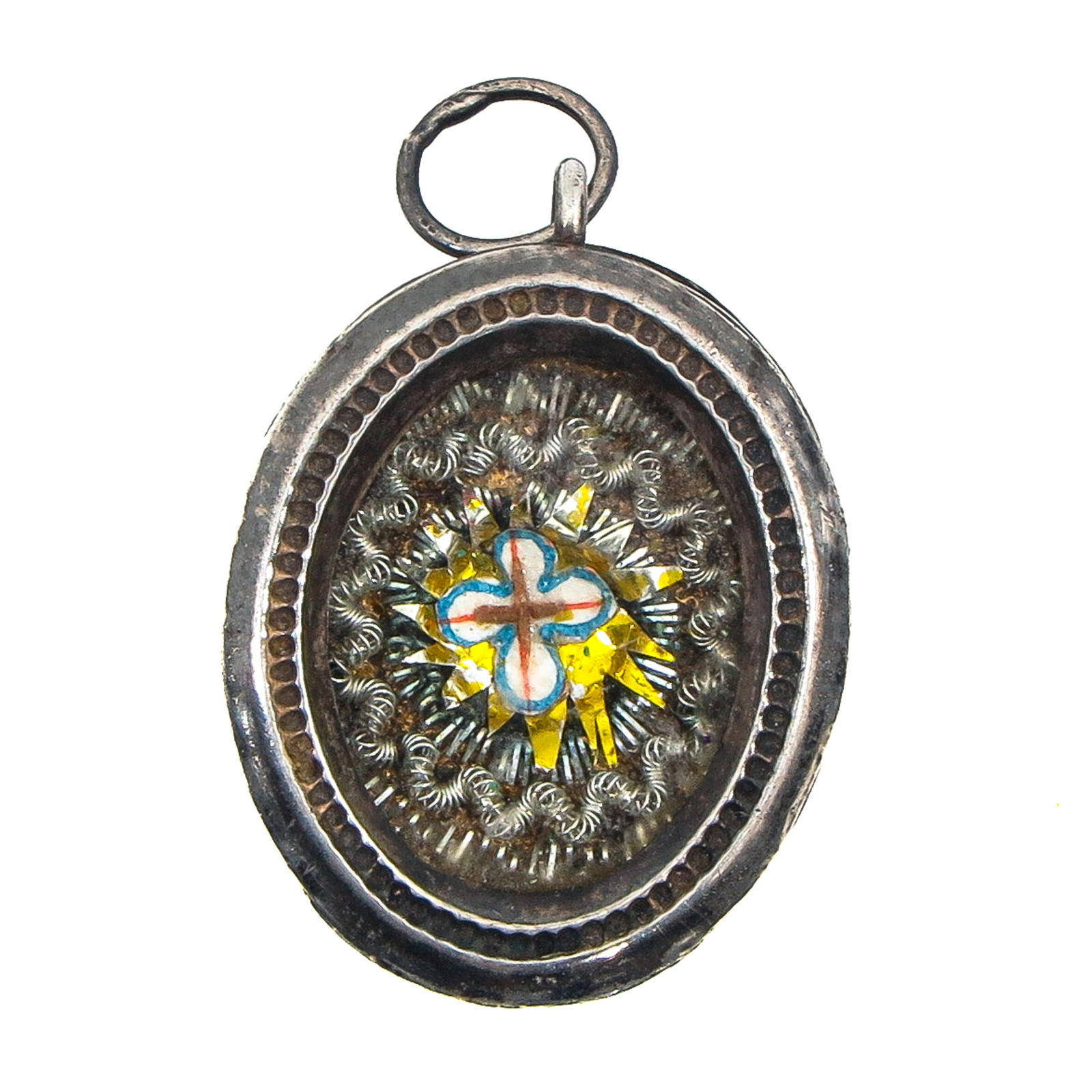 A Sealed Reliquary: Silver, containing a relic of the Holy Cross, length 3 cm. You are purchasing the theca. The relics are a gift.