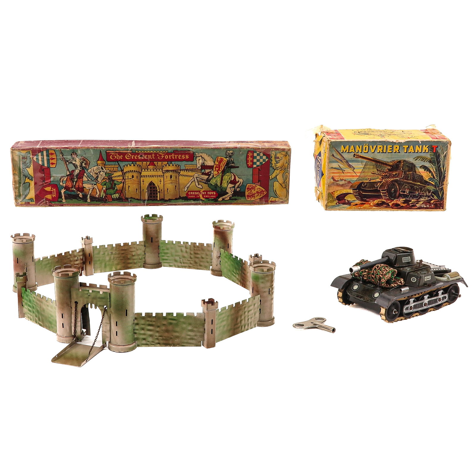 A Group of Tin Toys: tin toys, consisting of a castle set The Crescent Fortress and Manovrier Tank, with original boxes